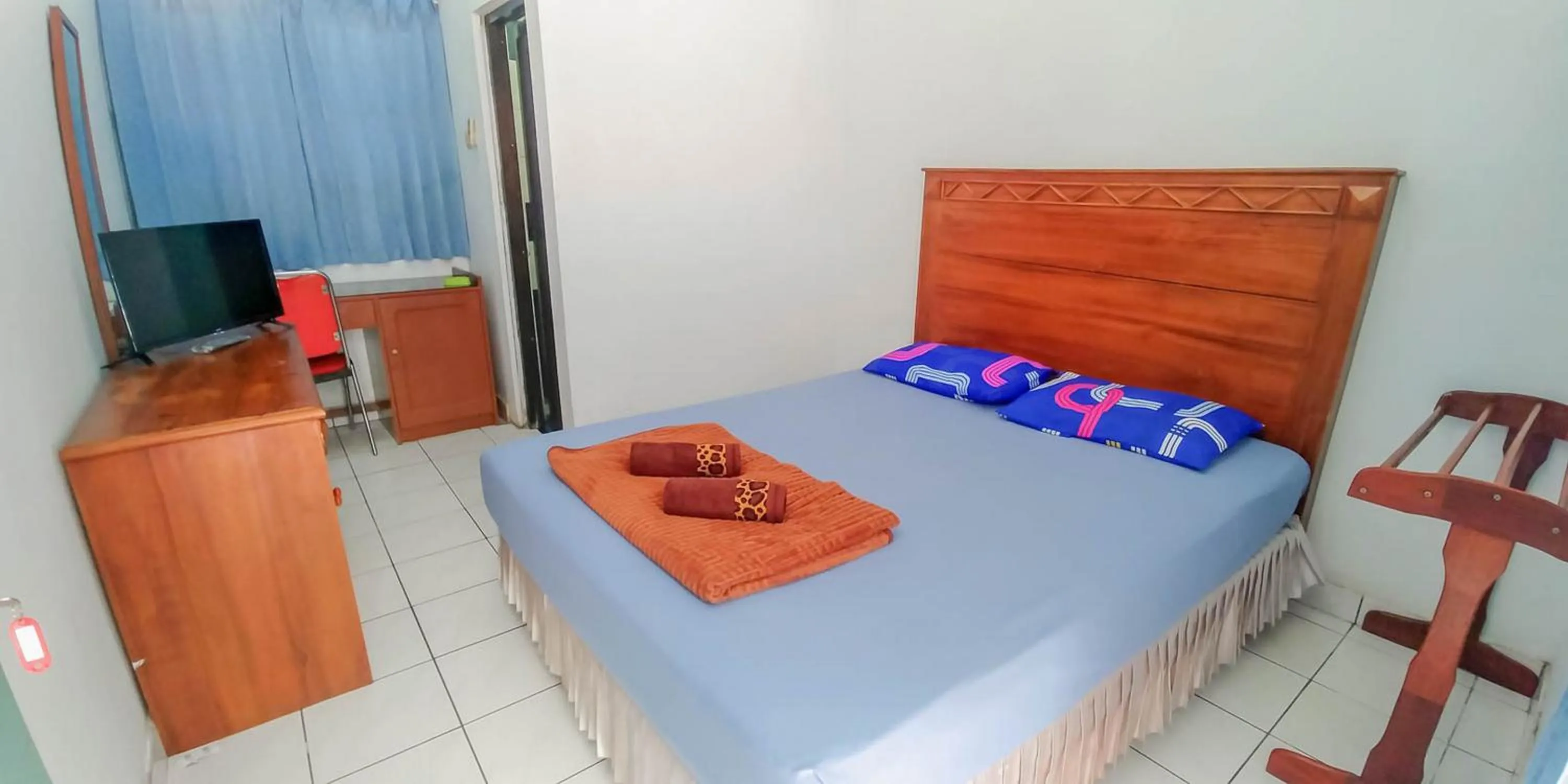 Bed in Hotel Rajawali Mitra RedDoorz