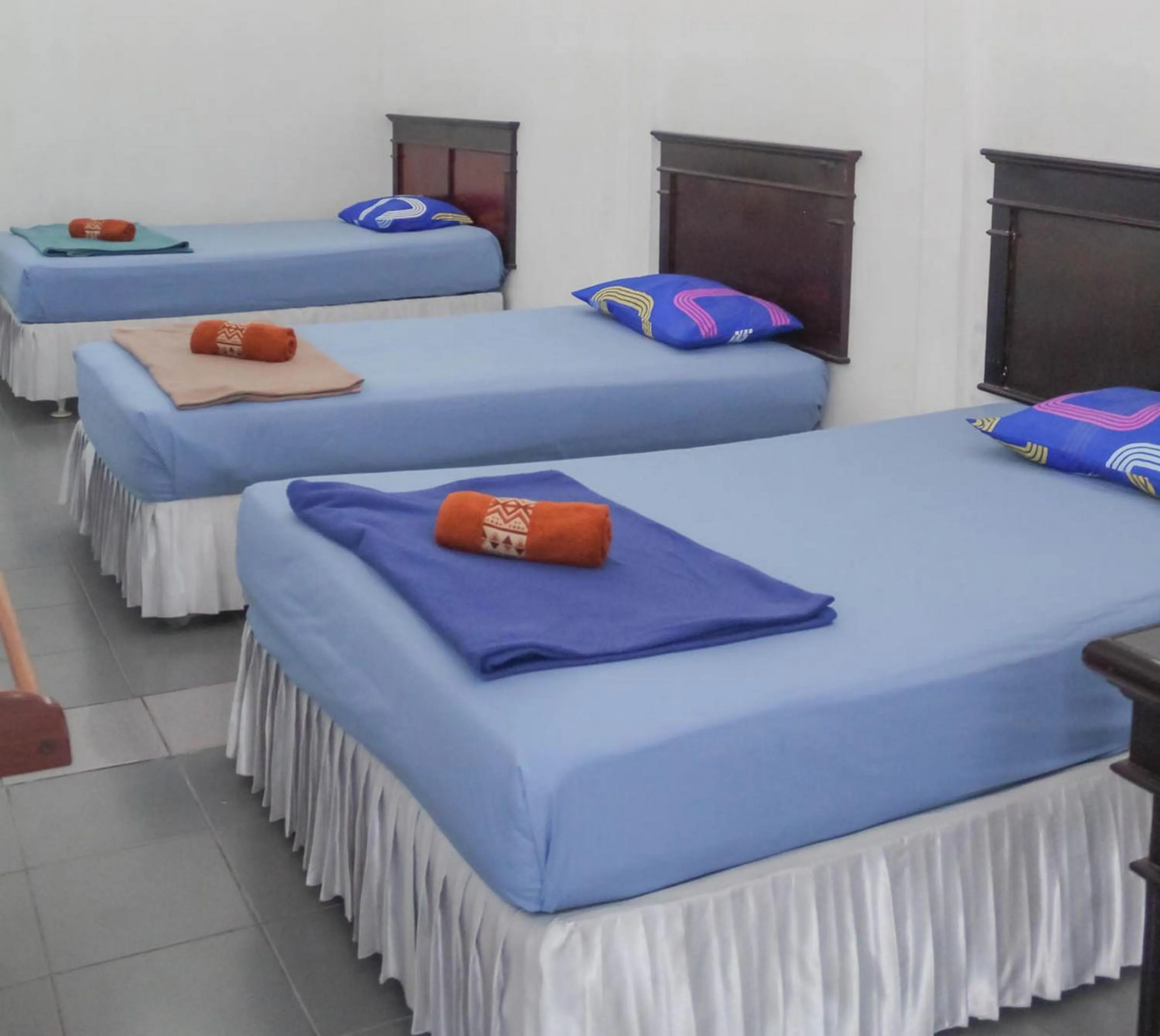 Bed in Hotel Rajawali Mitra RedDoorz