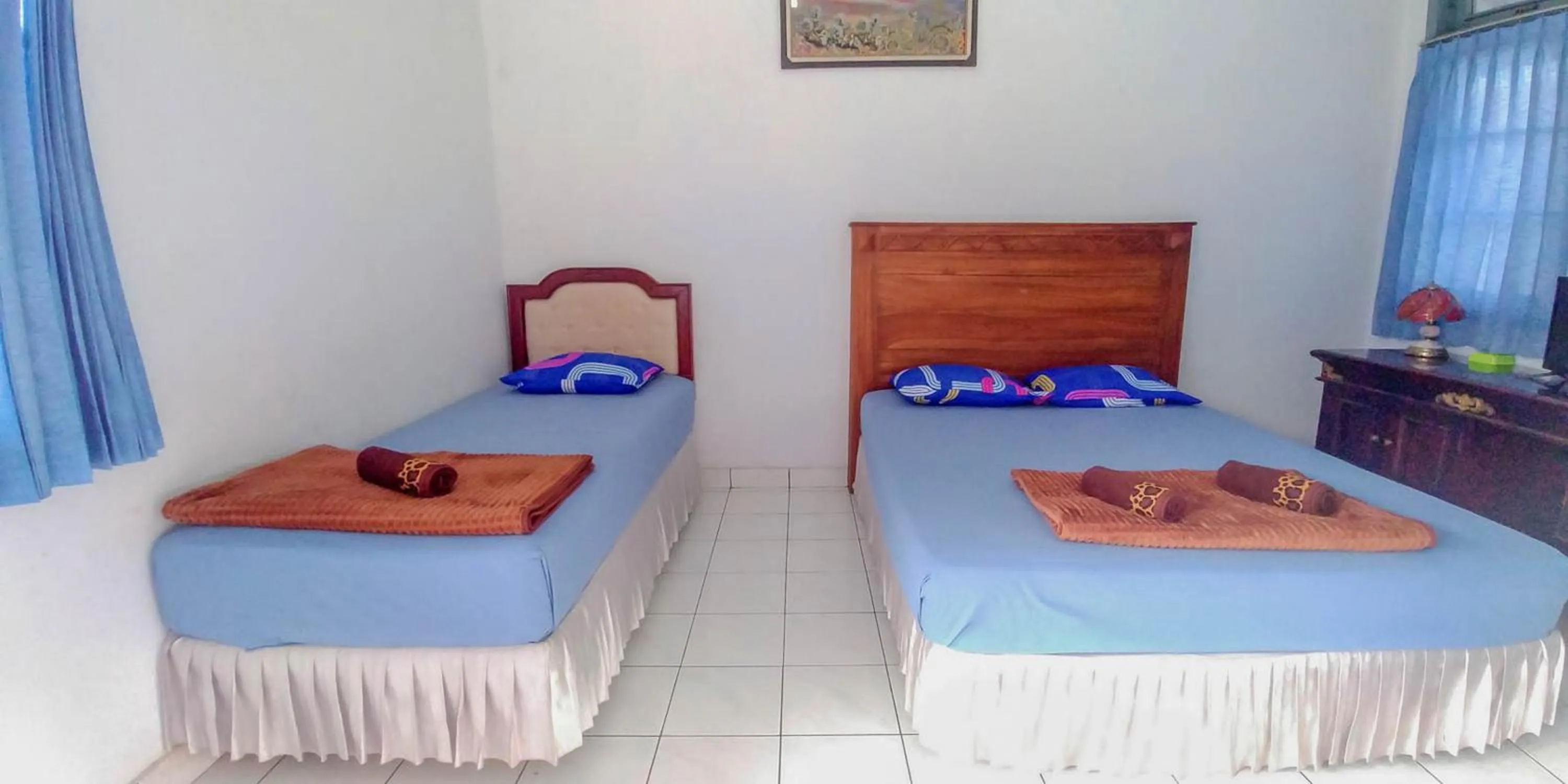 Bed in Hotel Rajawali Mitra RedDoorz