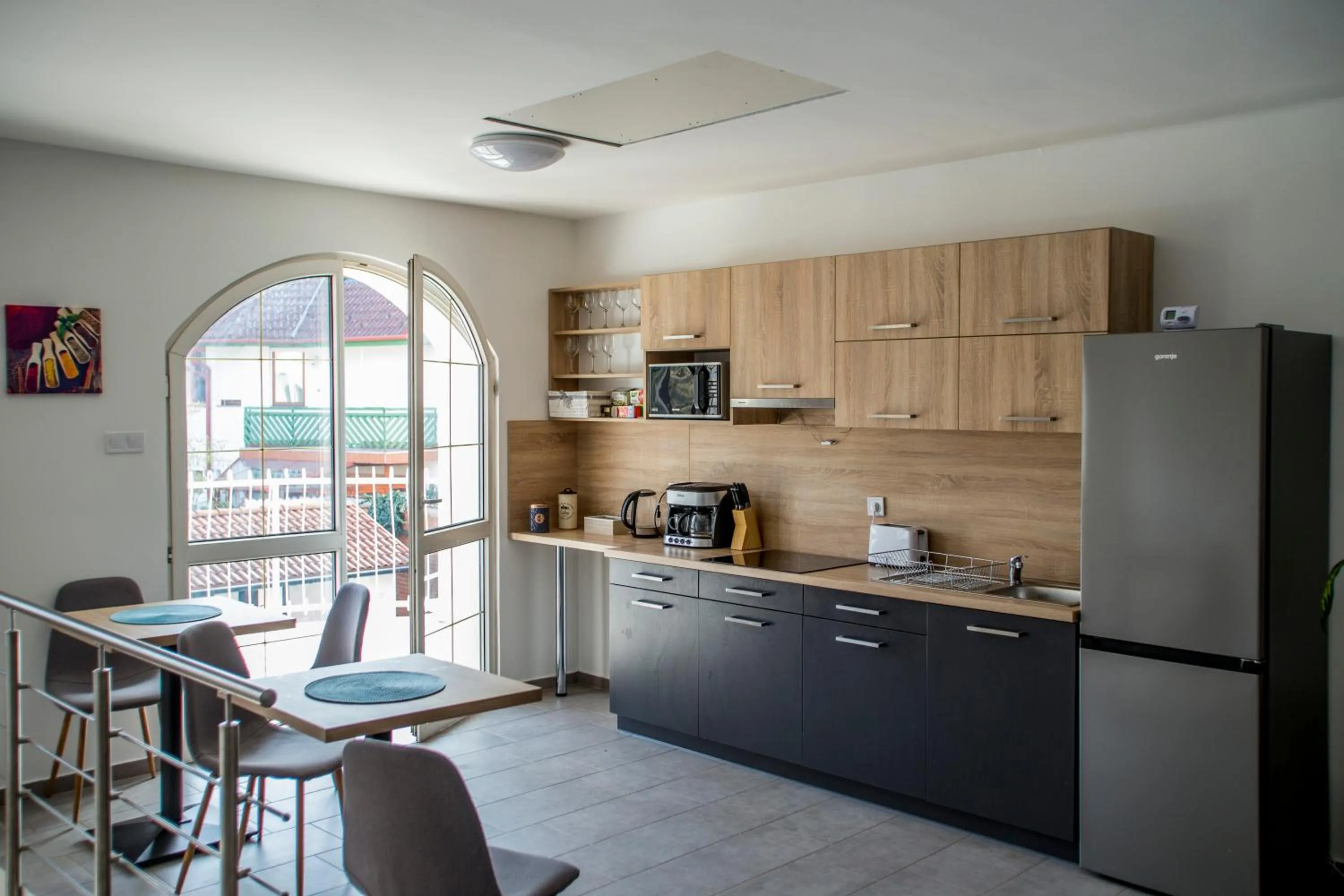 Kitchen or kitchenette in Főnix Design Rooms