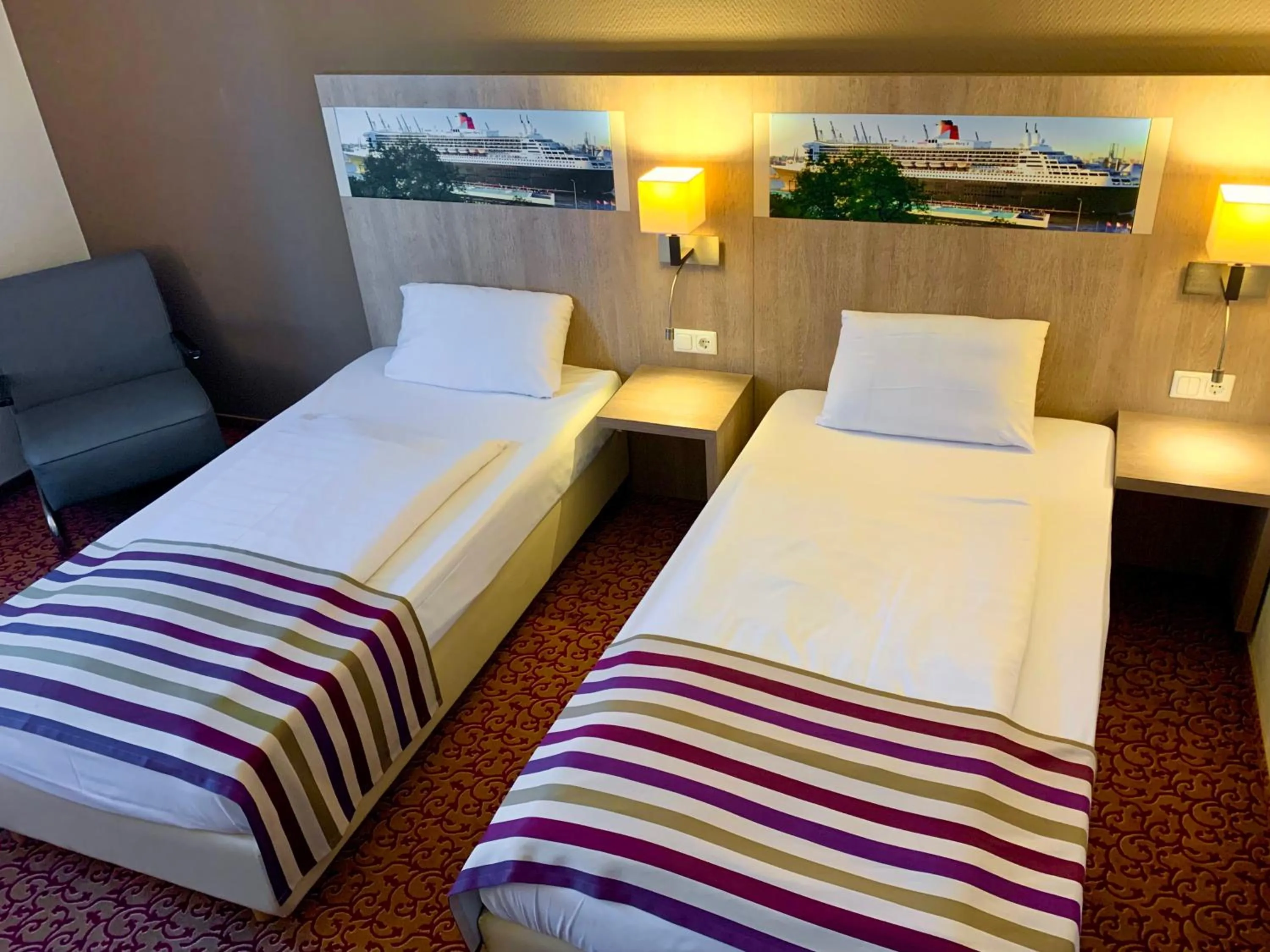 Photo of the whole room, Bed in Mercure Hotel Hamburg am Volkspark