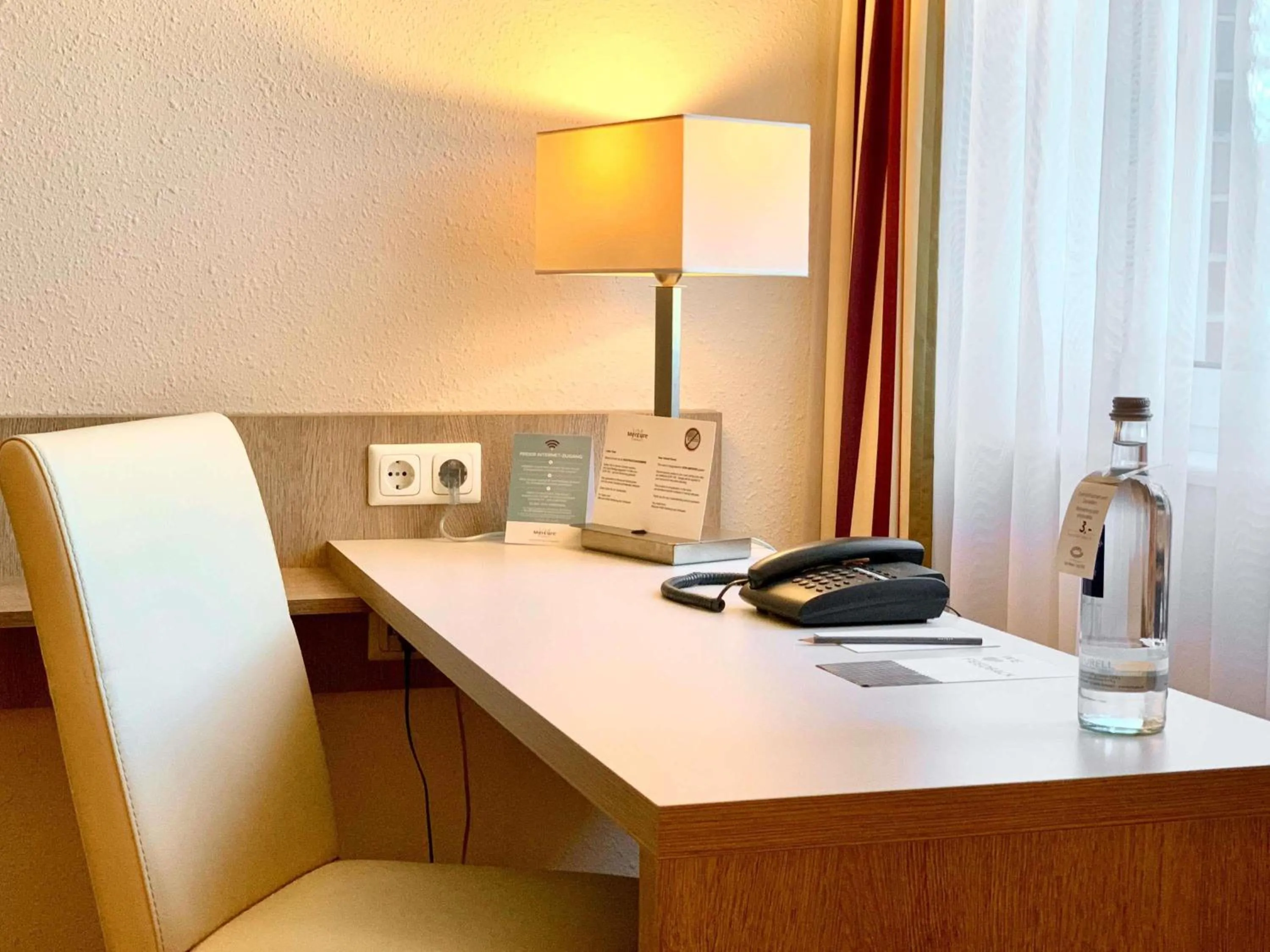 Bedroom in Mercure Hotel Hamburg am Volkspark