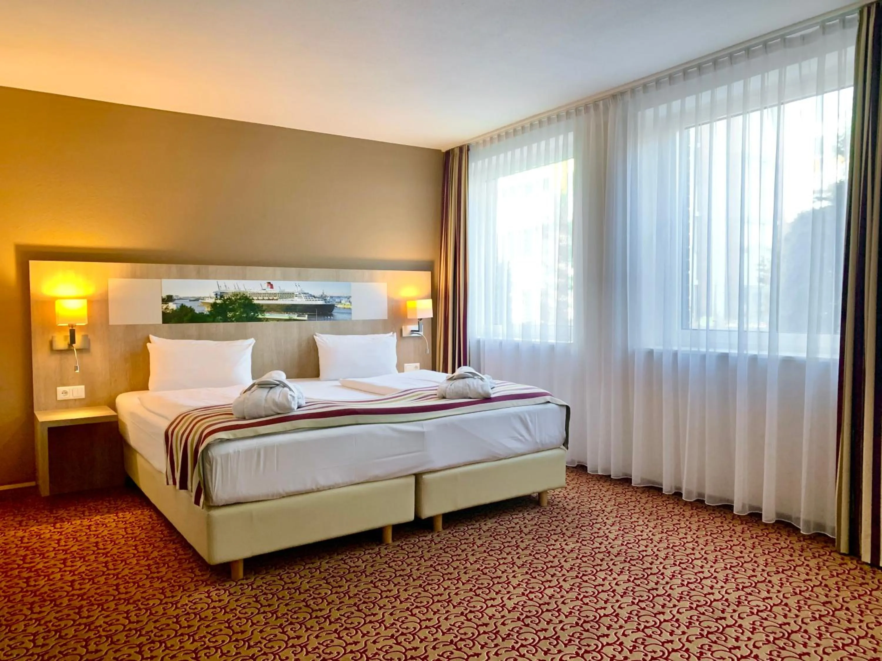 Bed in Mercure Hotel Hamburg am Volkspark