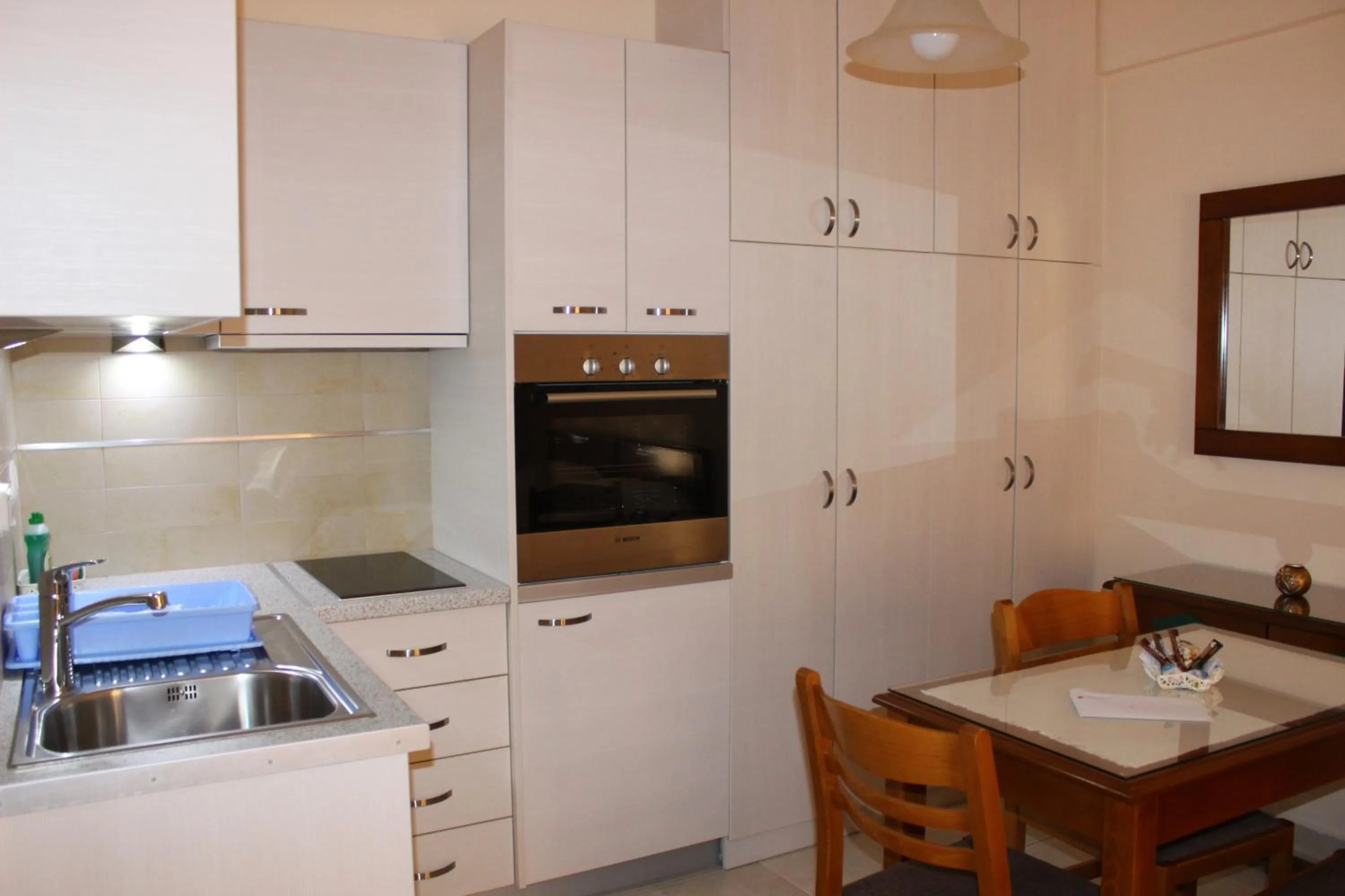 Kitchen or kitchenette in Rouchotas Apartments