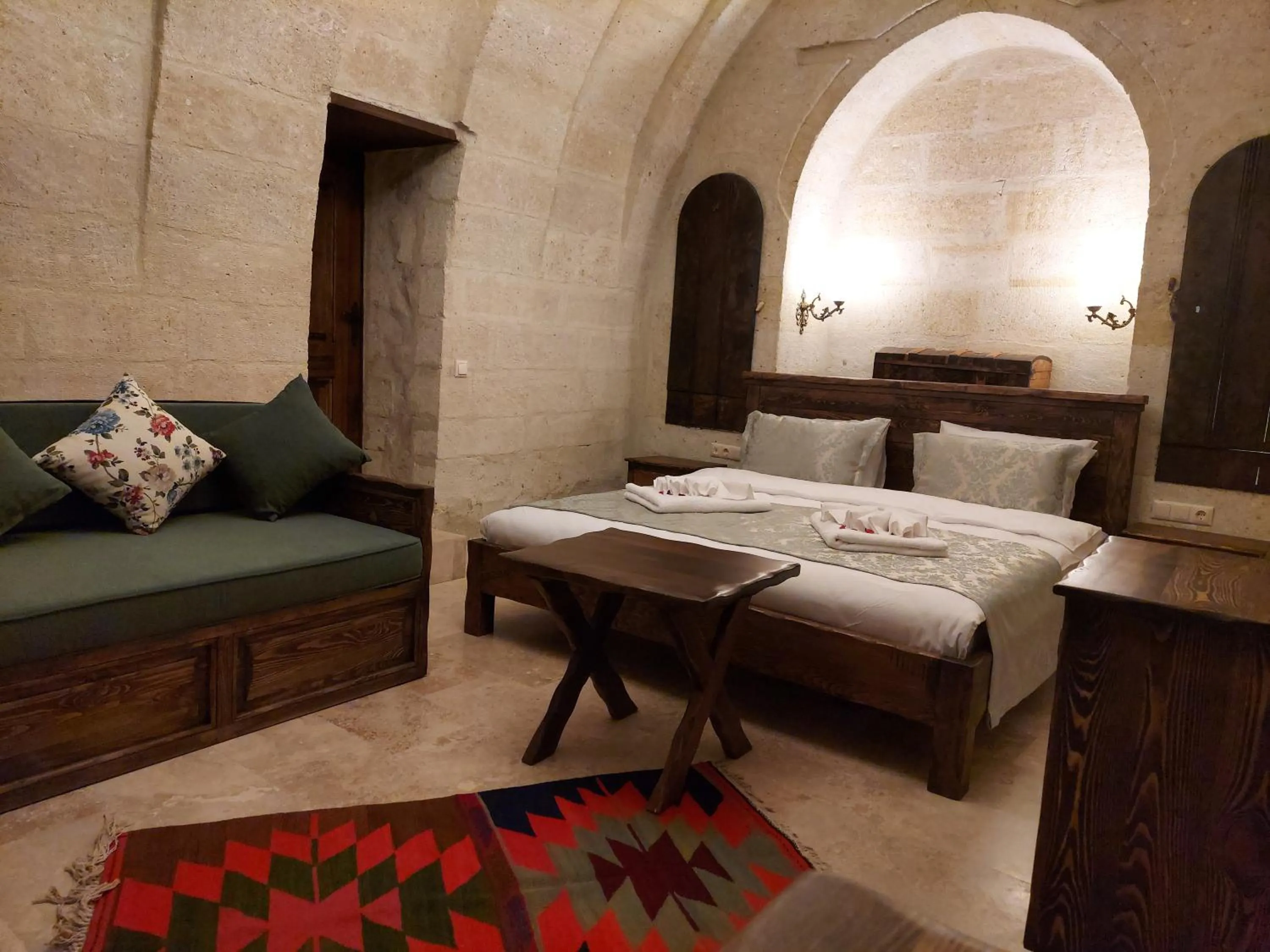Bed in ARMEsos Cave Hotel