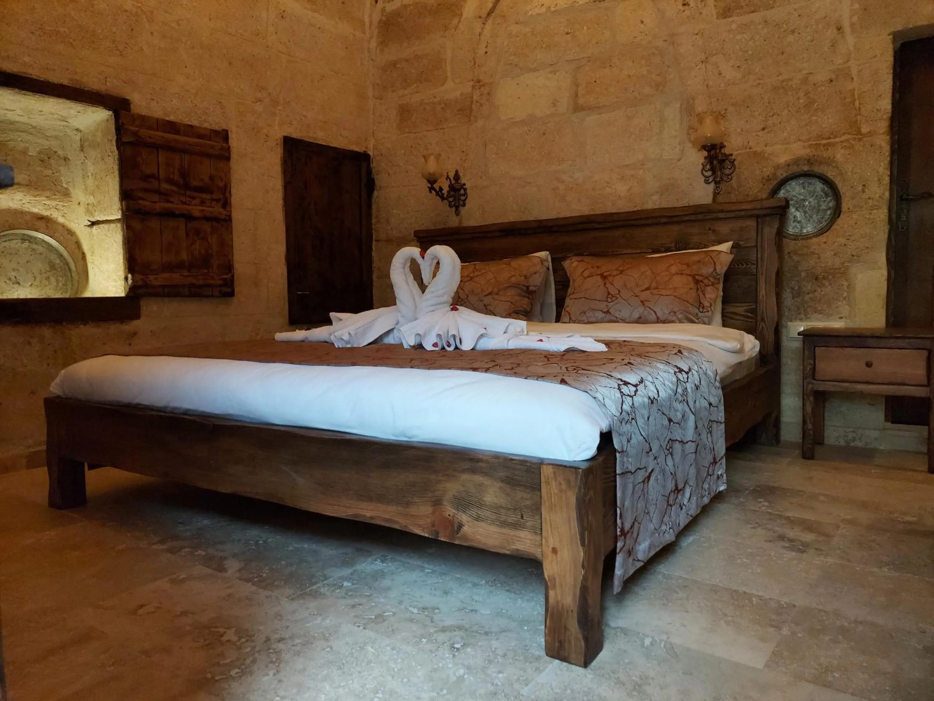 Bed in ARMEsos Cave Hotel