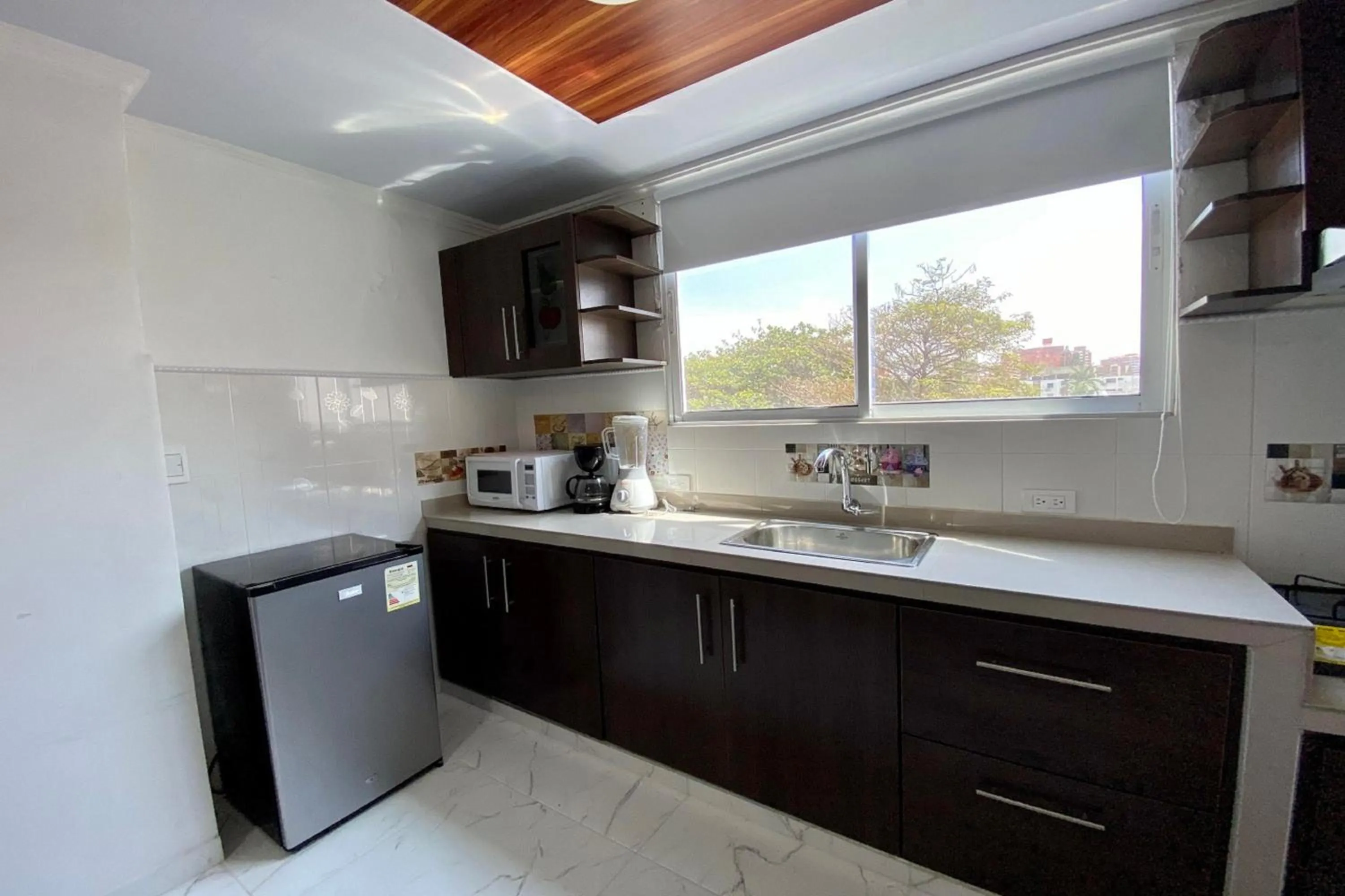Kitchen or kitchenette in Villa Santos Apartaestudios