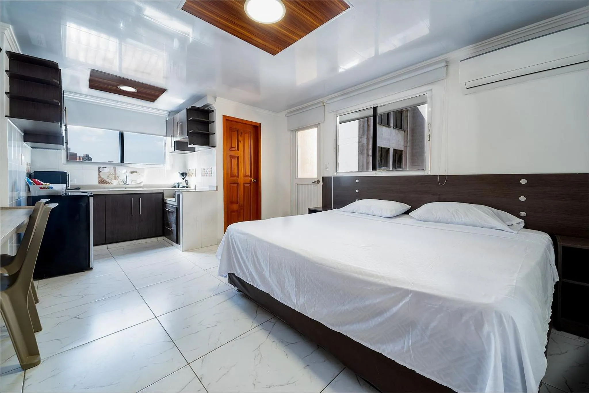 Bed in Villa Santos Apartaestudios