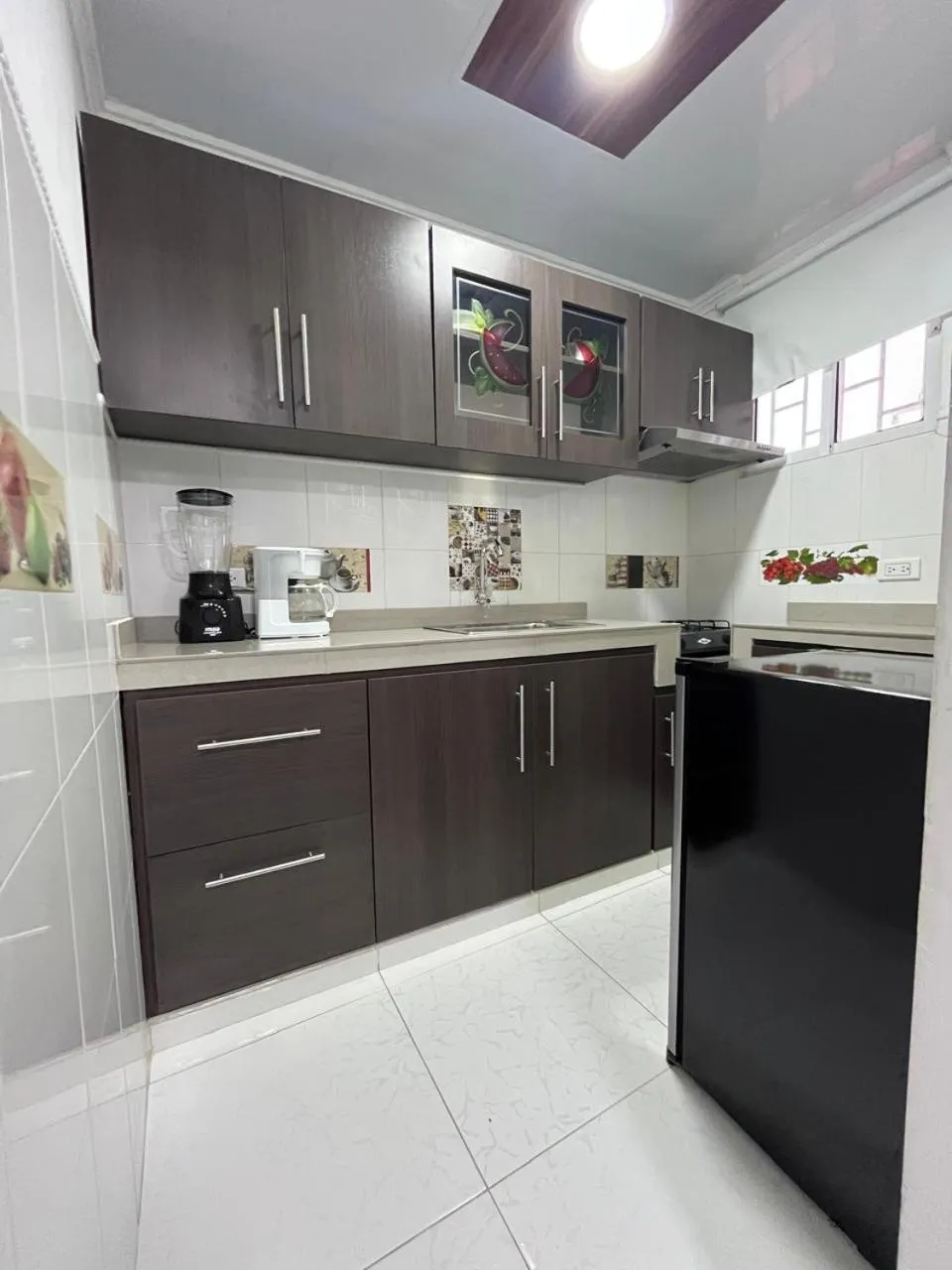 Kitchen or kitchenette in Villa Santos Apartaestudios