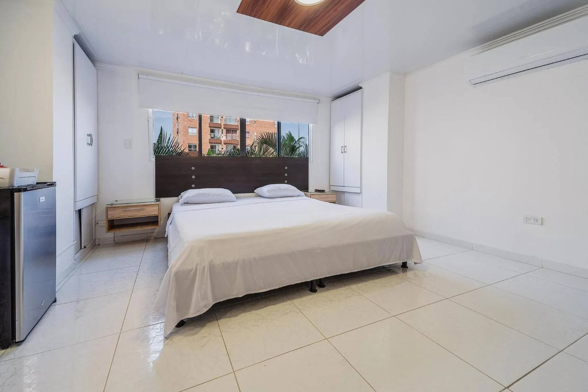 Bed in Villa Santos Apartaestudios