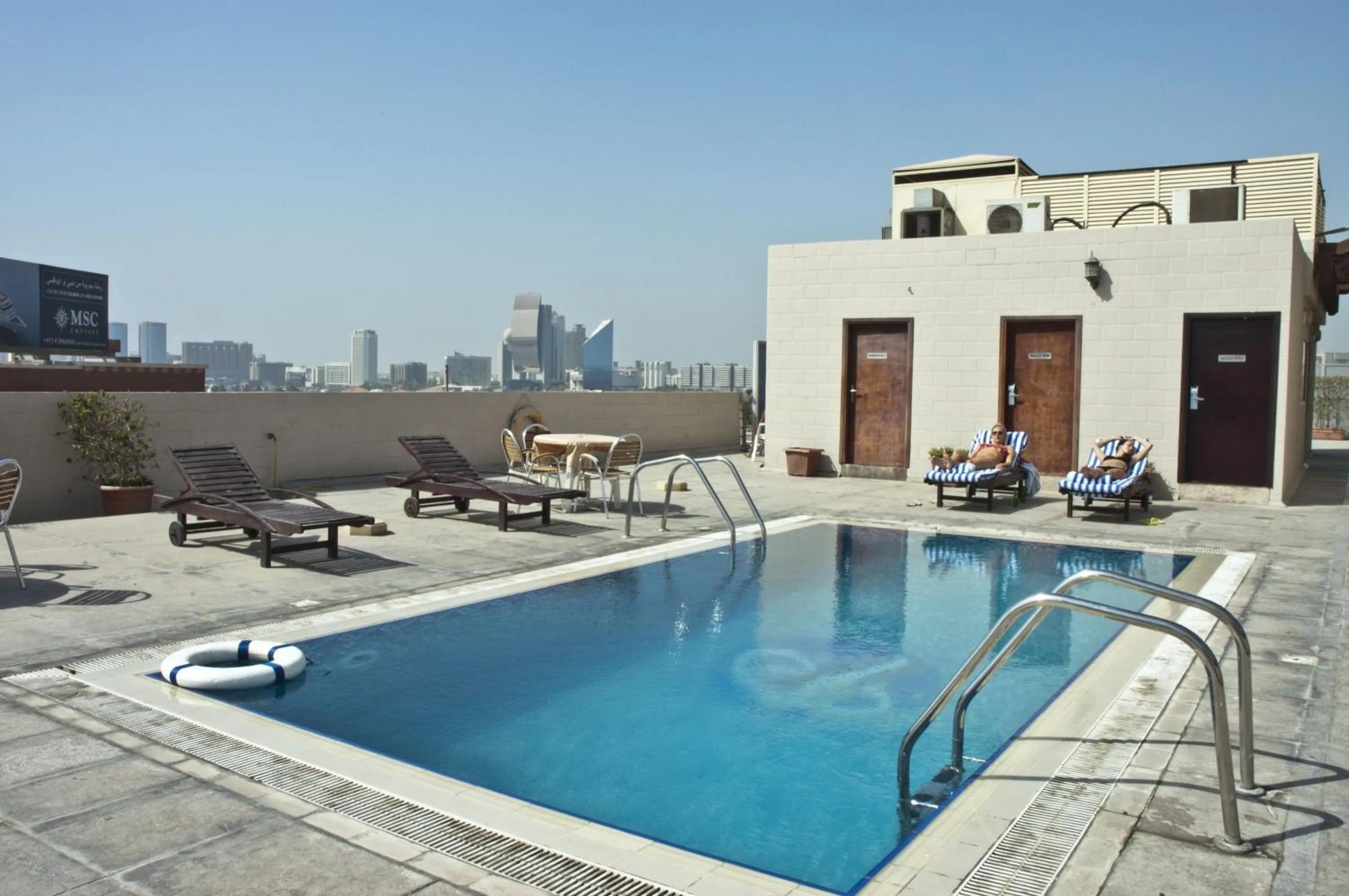 Swimming pool in Ramee Royal Hotel