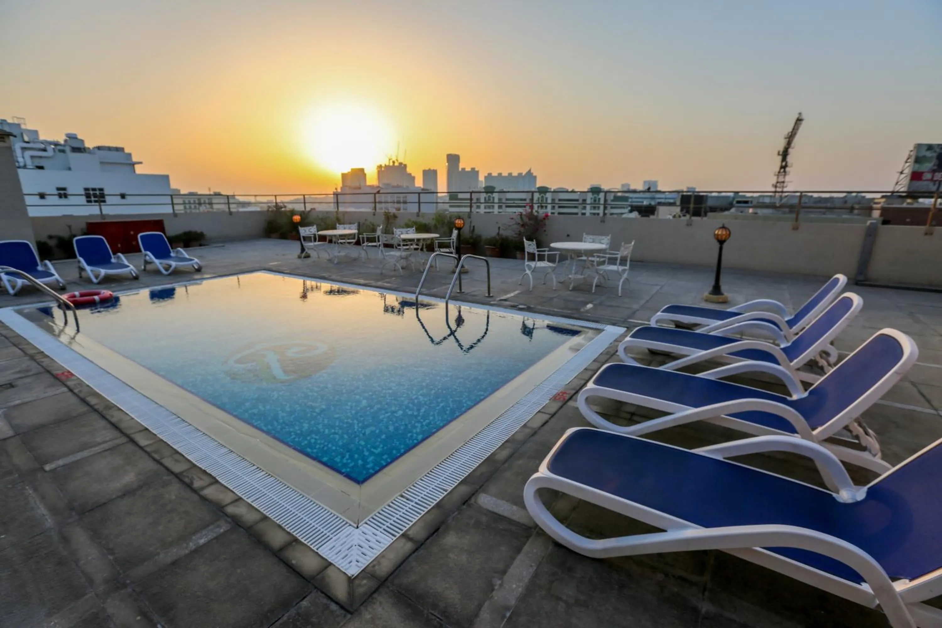 Swimming pool in Ramee Royal Hotel