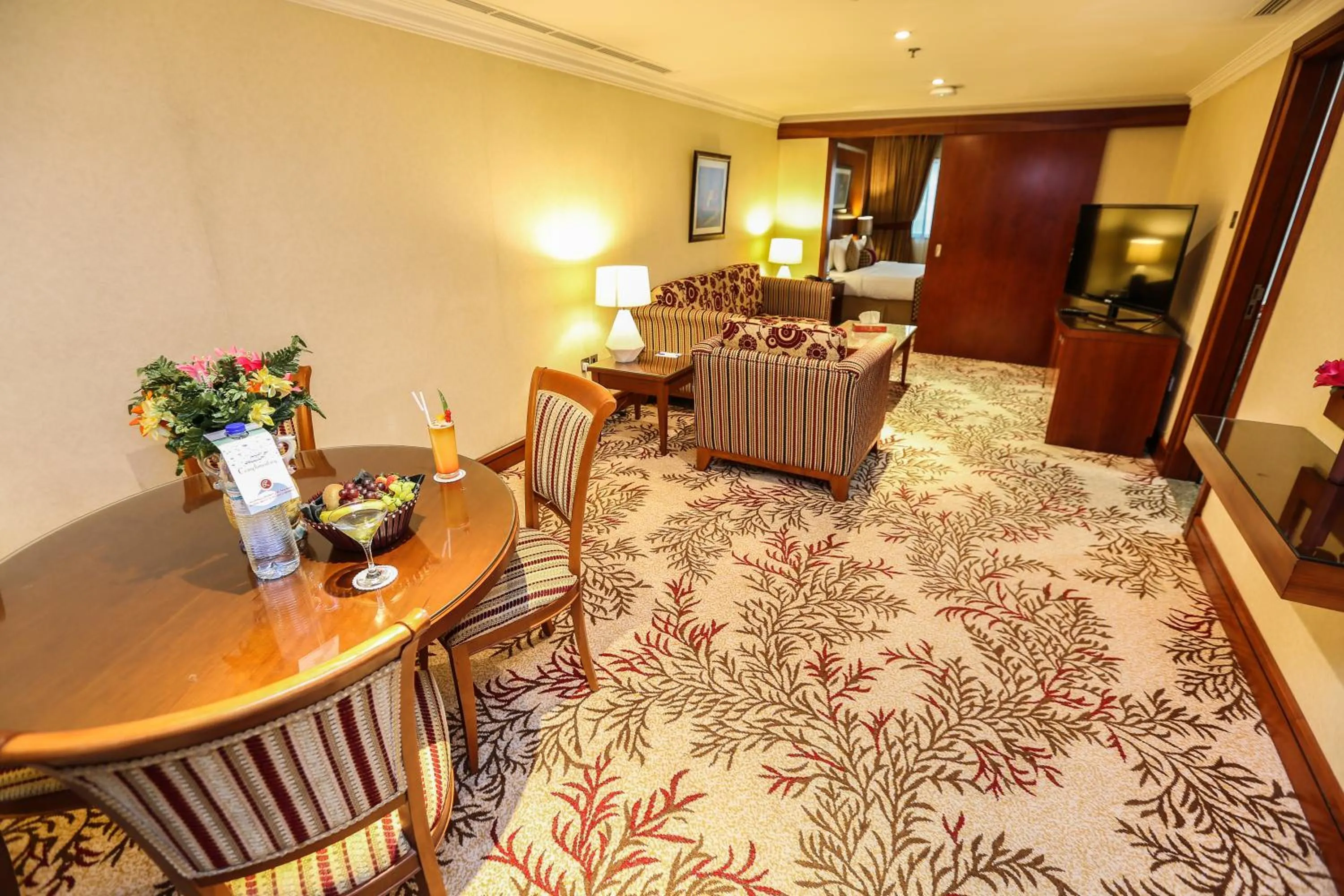 Living room in Ramee Royal Hotel