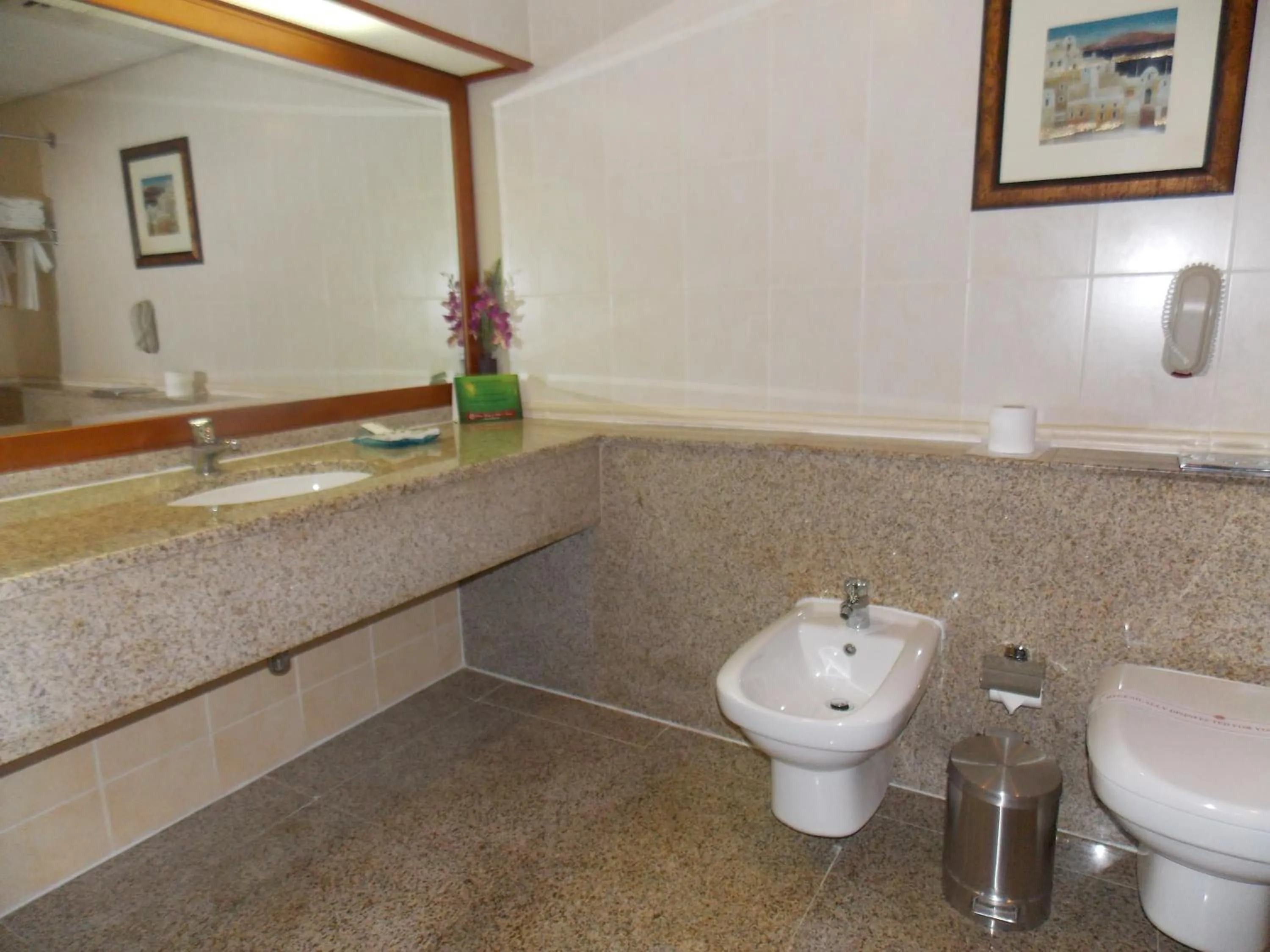 Bathroom in Ramee Royal Hotel