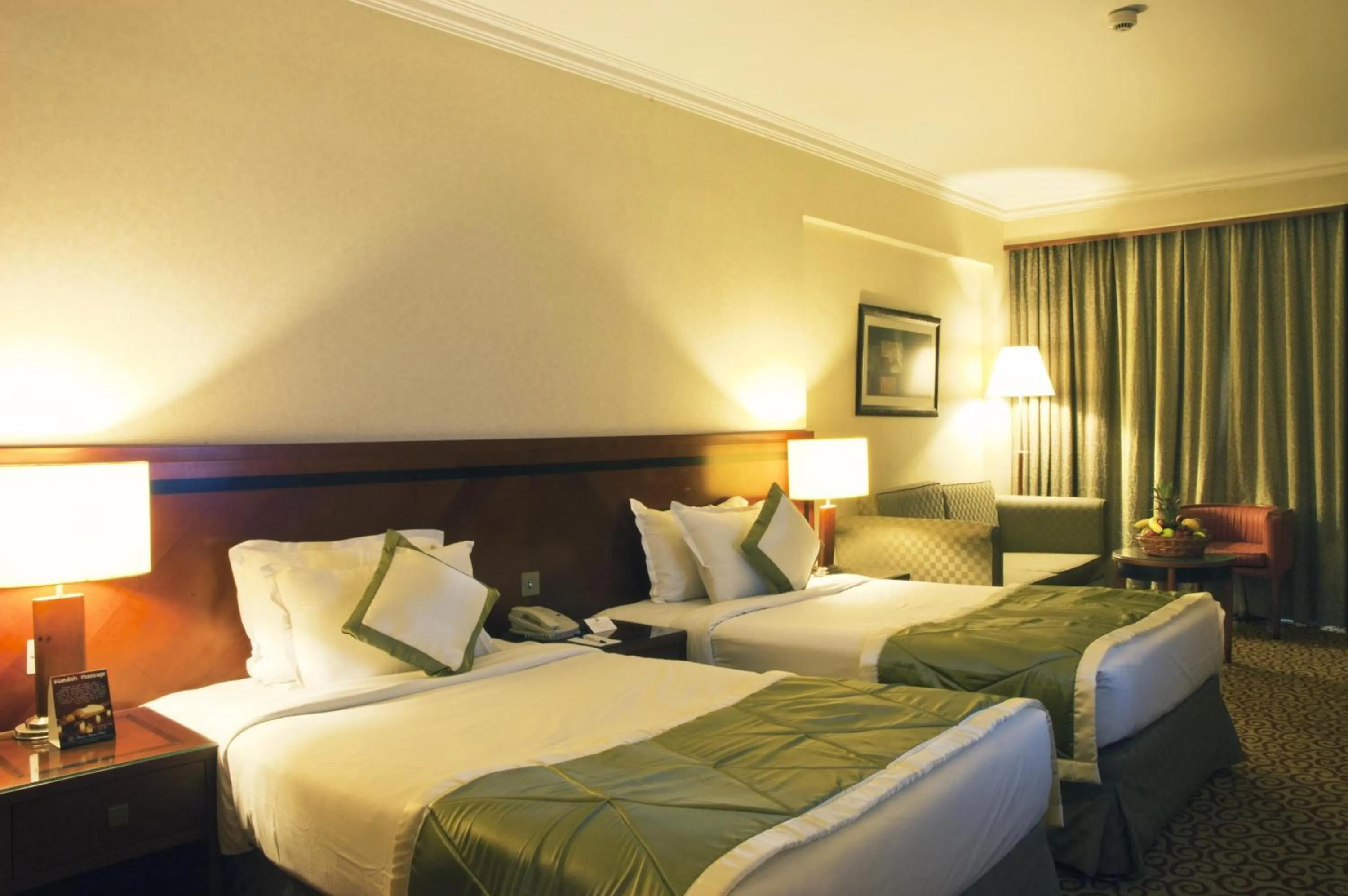 Photo of the whole room, Bed in Ramee Royal Hotel