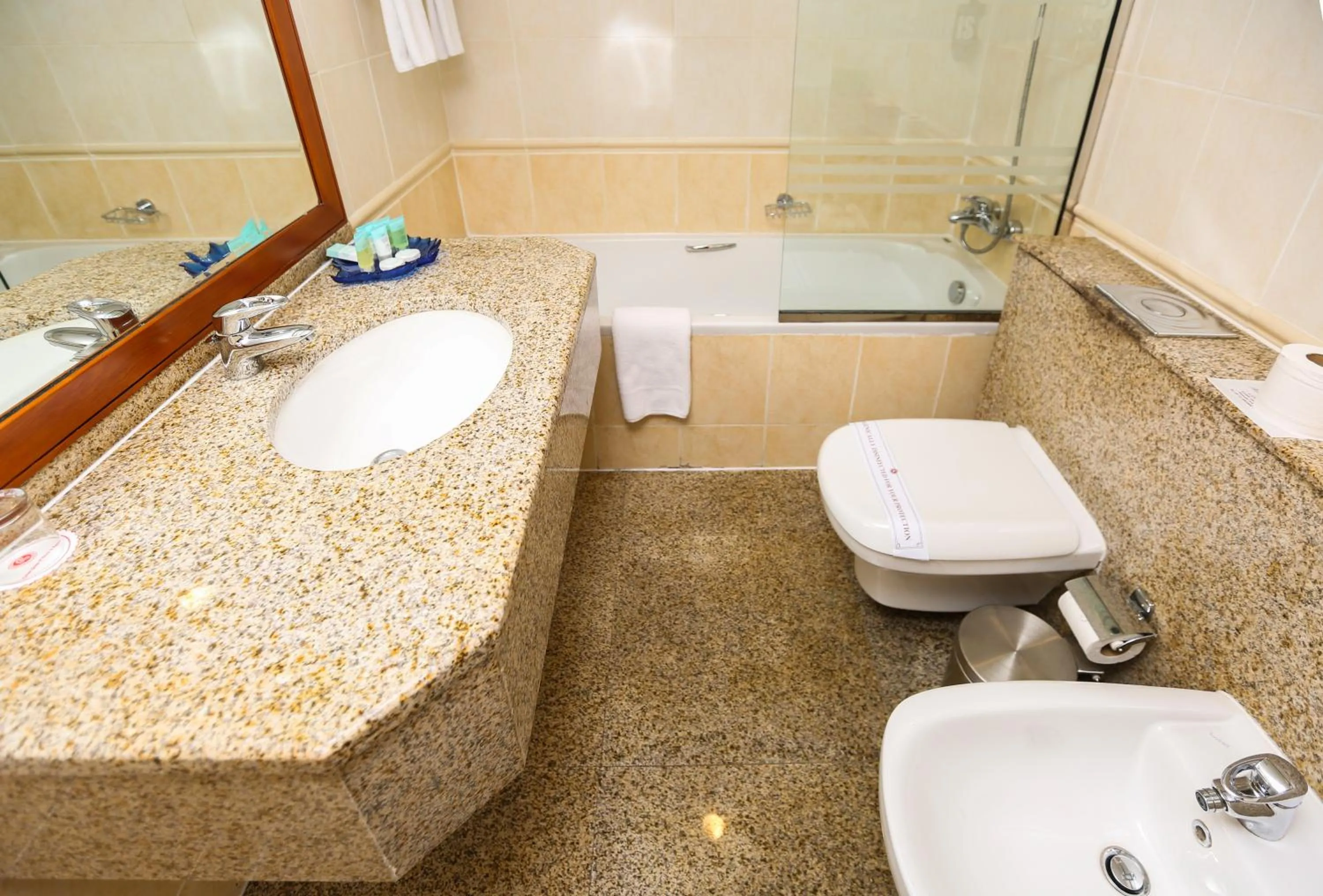 Bathroom in Ramee Royal Hotel