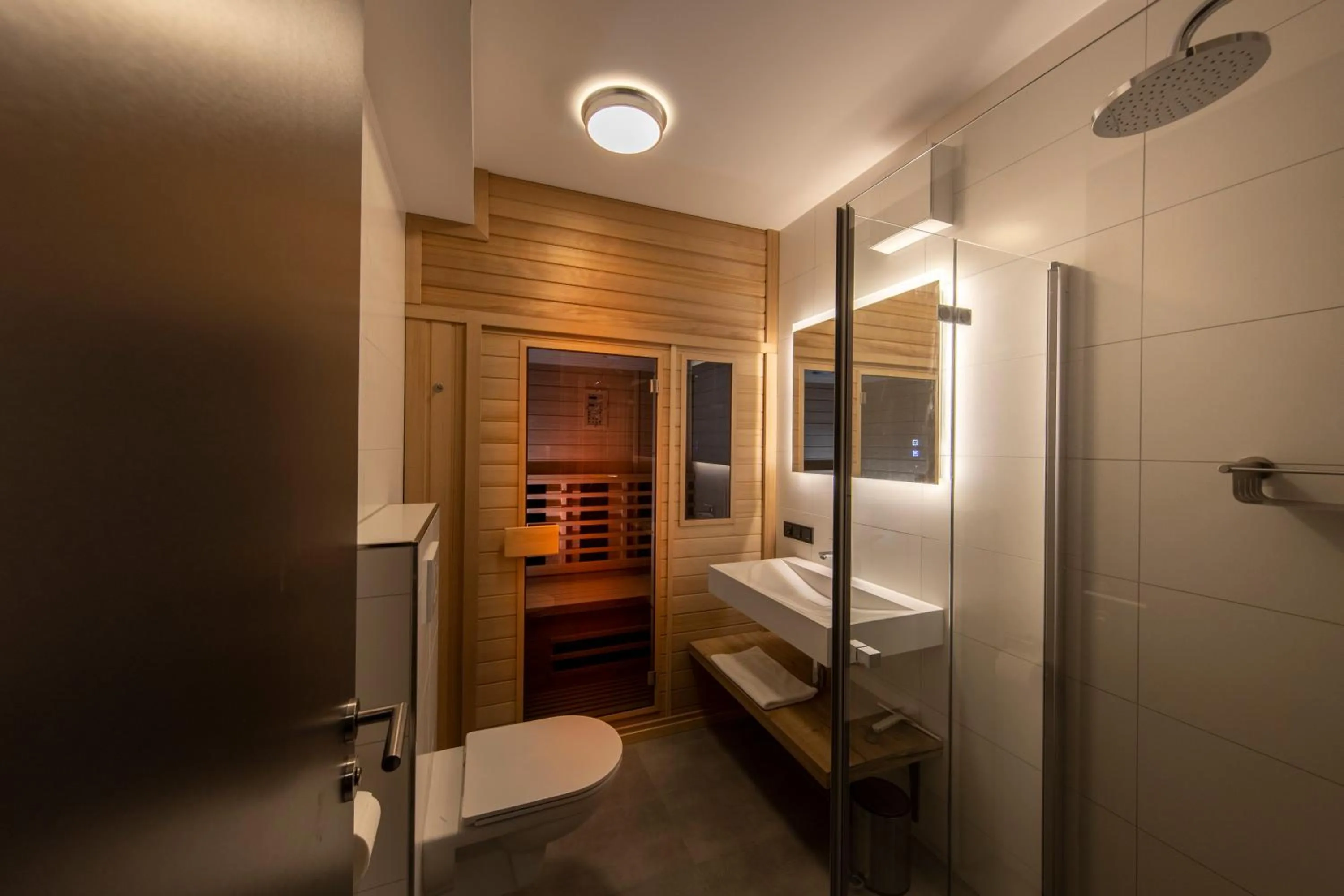 Shower, Bed in Astenblick Apartments Winterberg with sauna