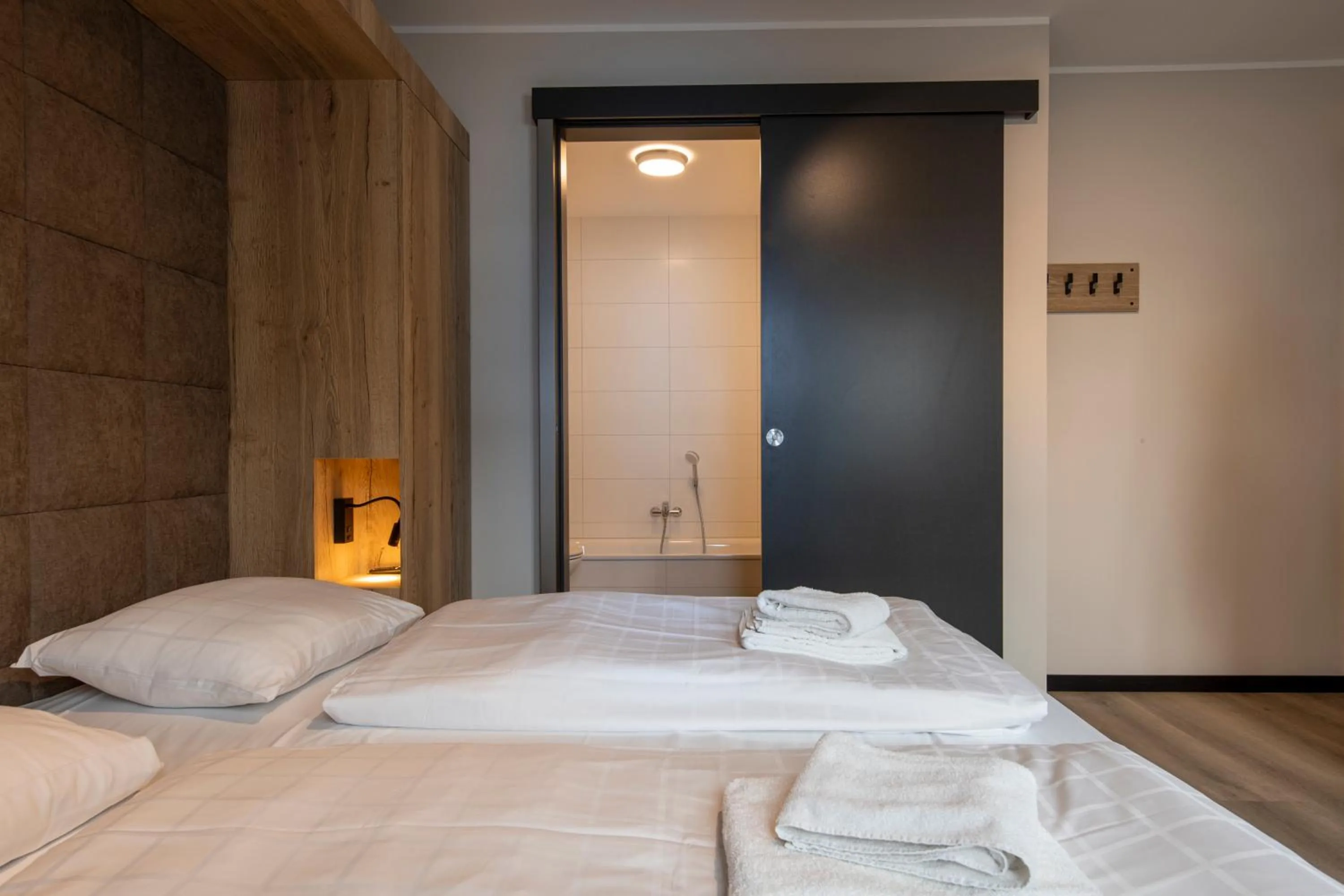 Bathroom, Bed in Astenblick Apartments Winterberg with sauna