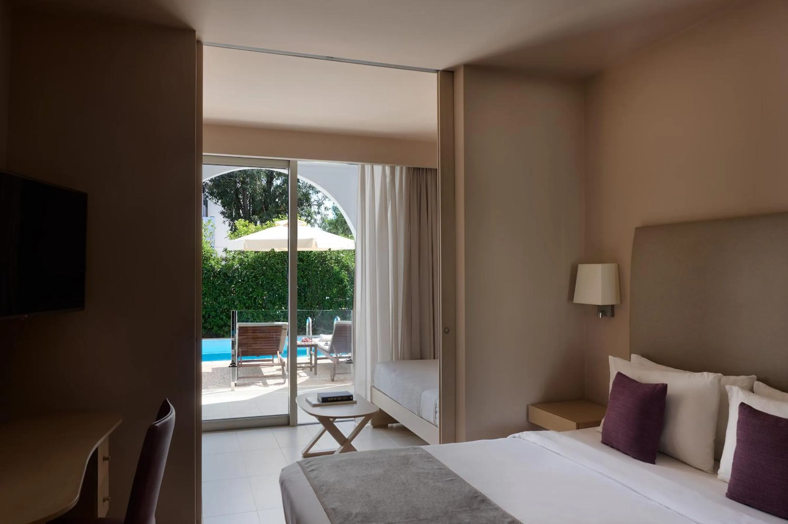 Bed in Atlantica Akti Zeus Hotel