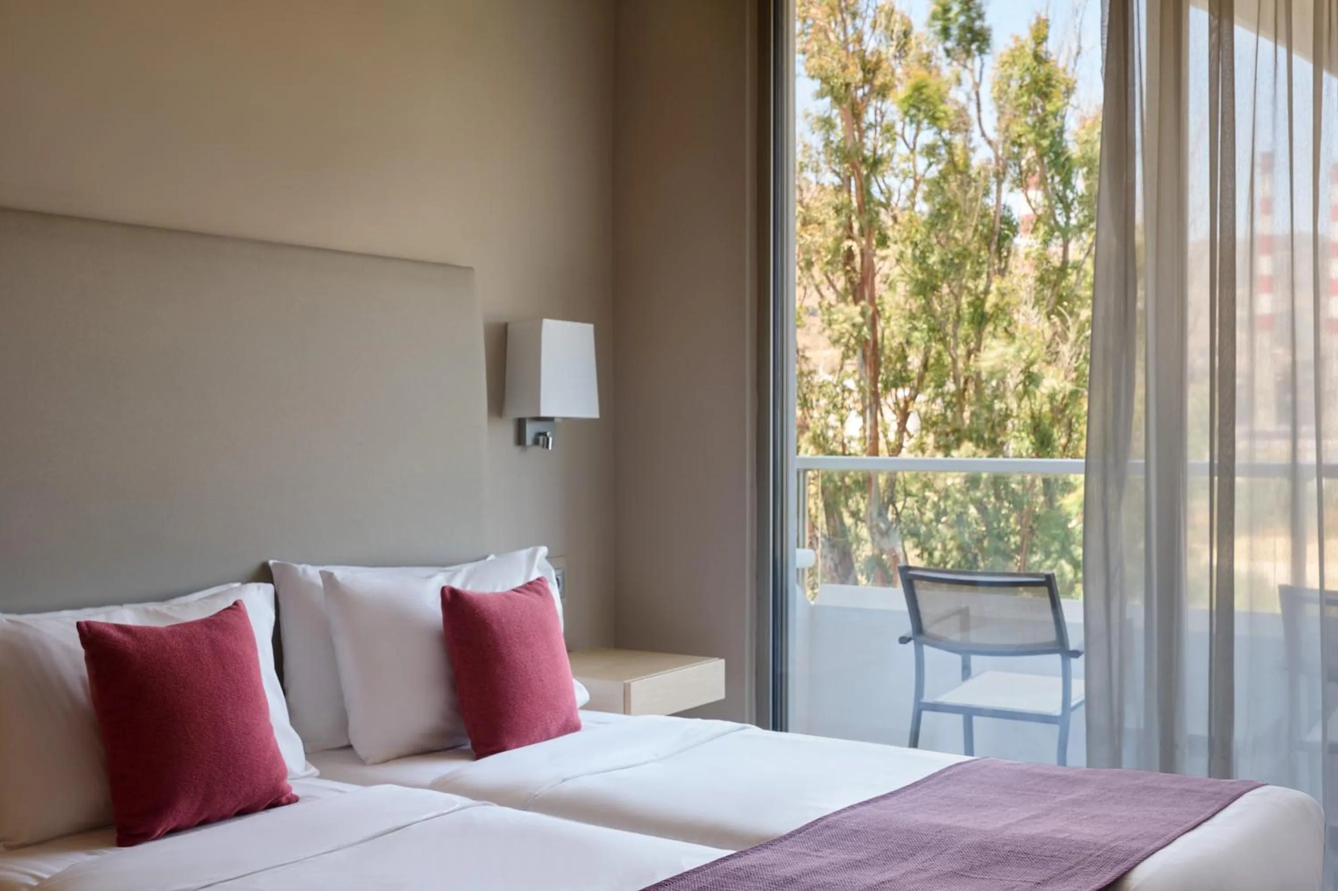 Bed in Atlantica Akti Zeus Hotel