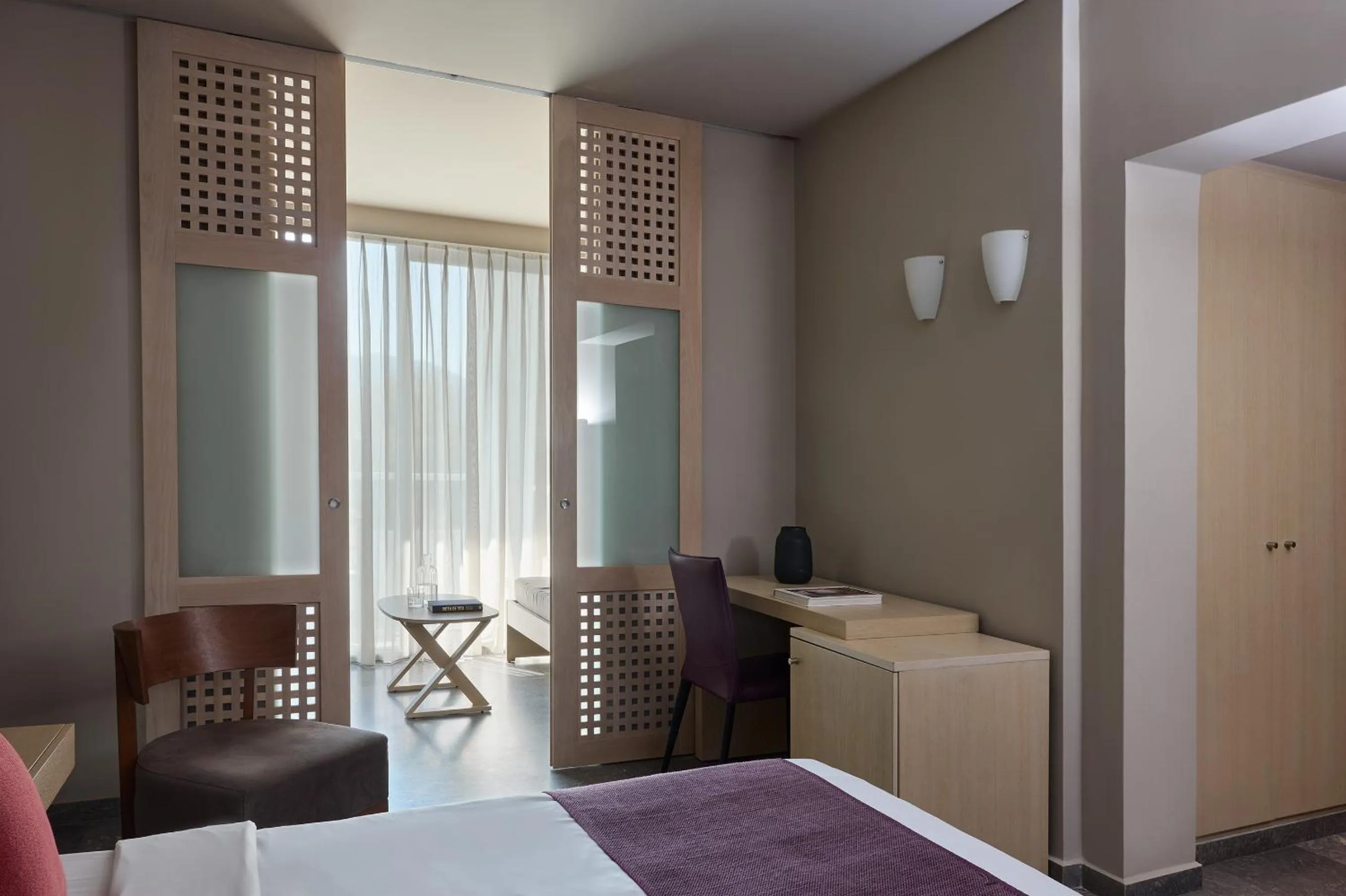 Bed in Atlantica Akti Zeus Hotel