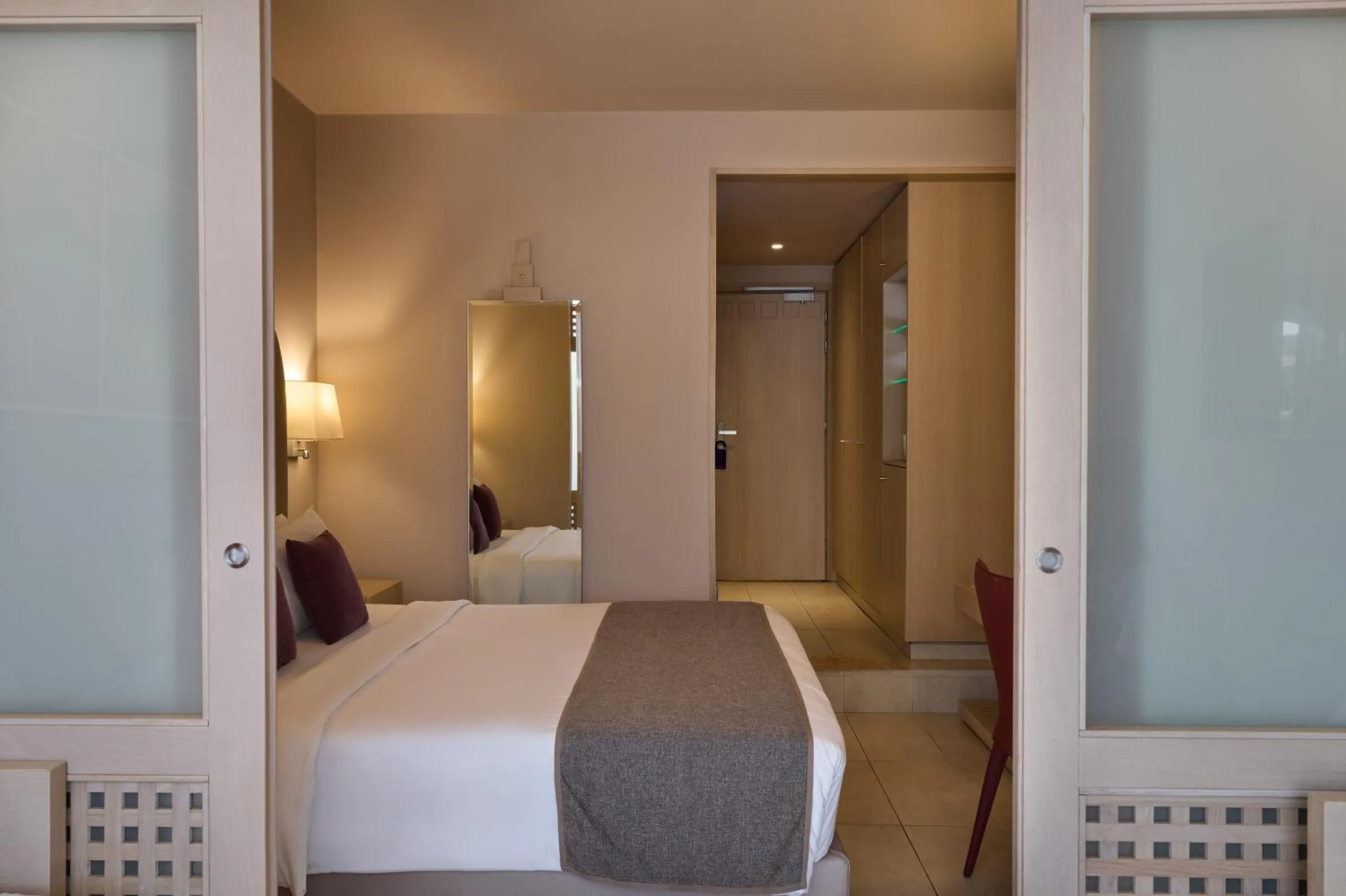 Bed in Atlantica Akti Zeus Hotel