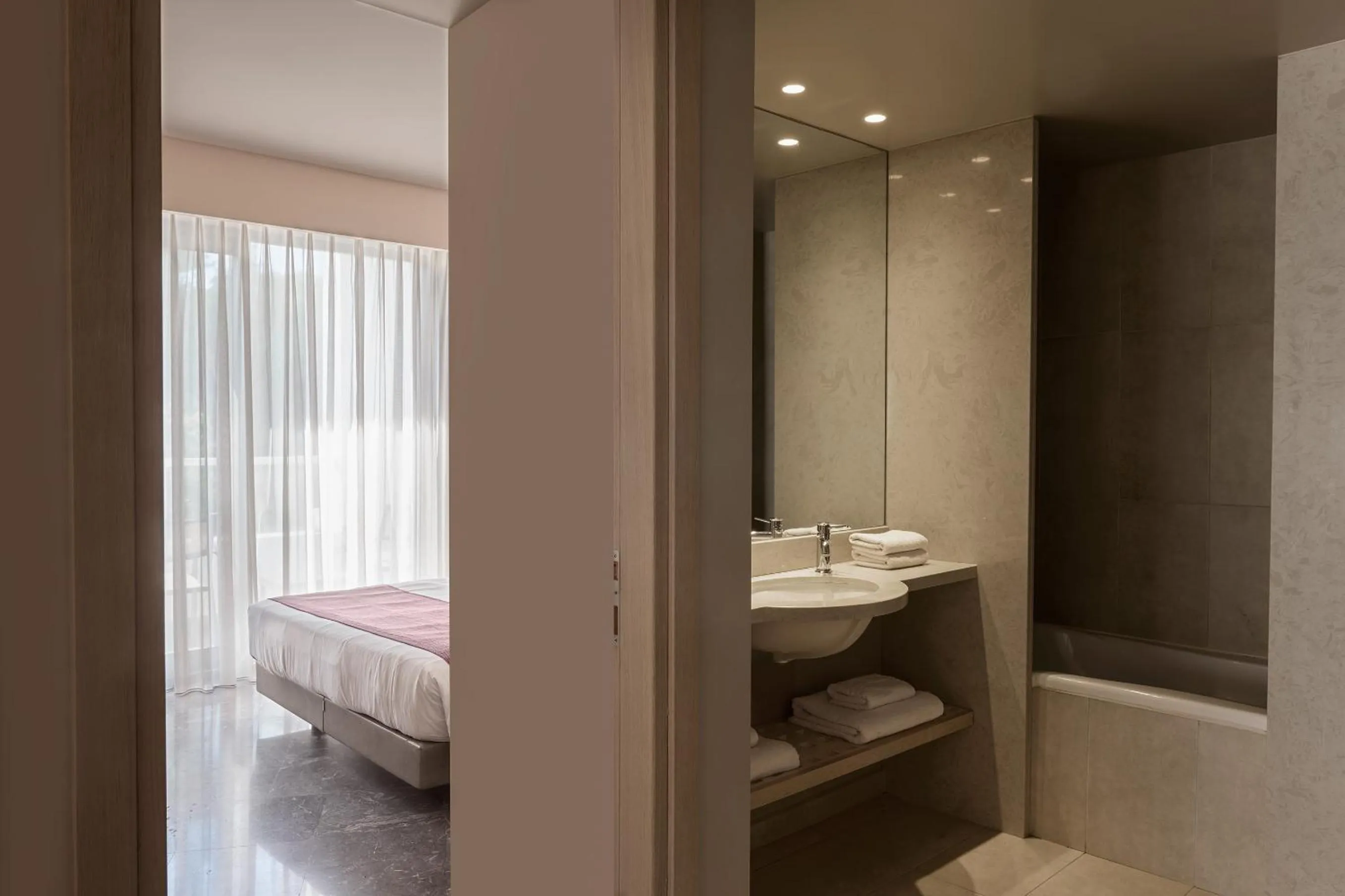 Bathroom, Bed in Atlantica Akti Zeus Hotel