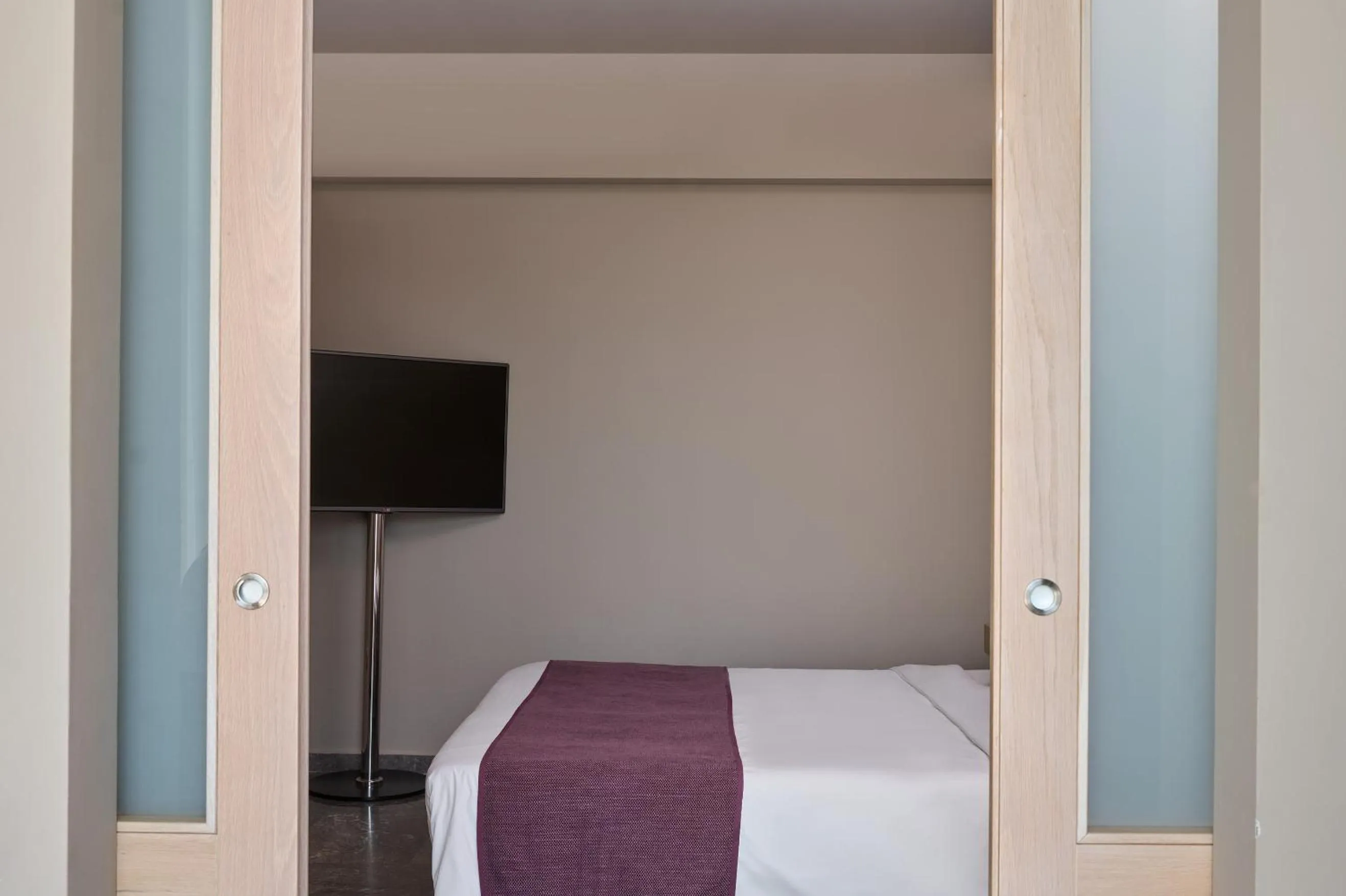 Bed in Atlantica Akti Zeus Hotel