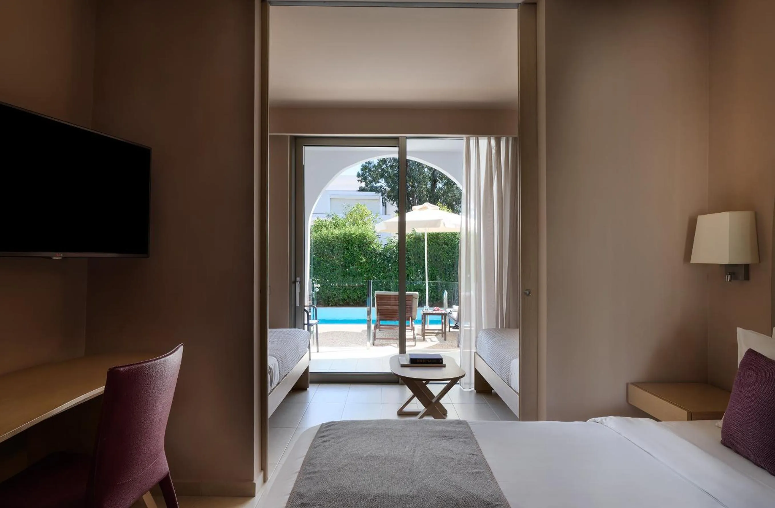 Bed in Atlantica Akti Zeus Hotel