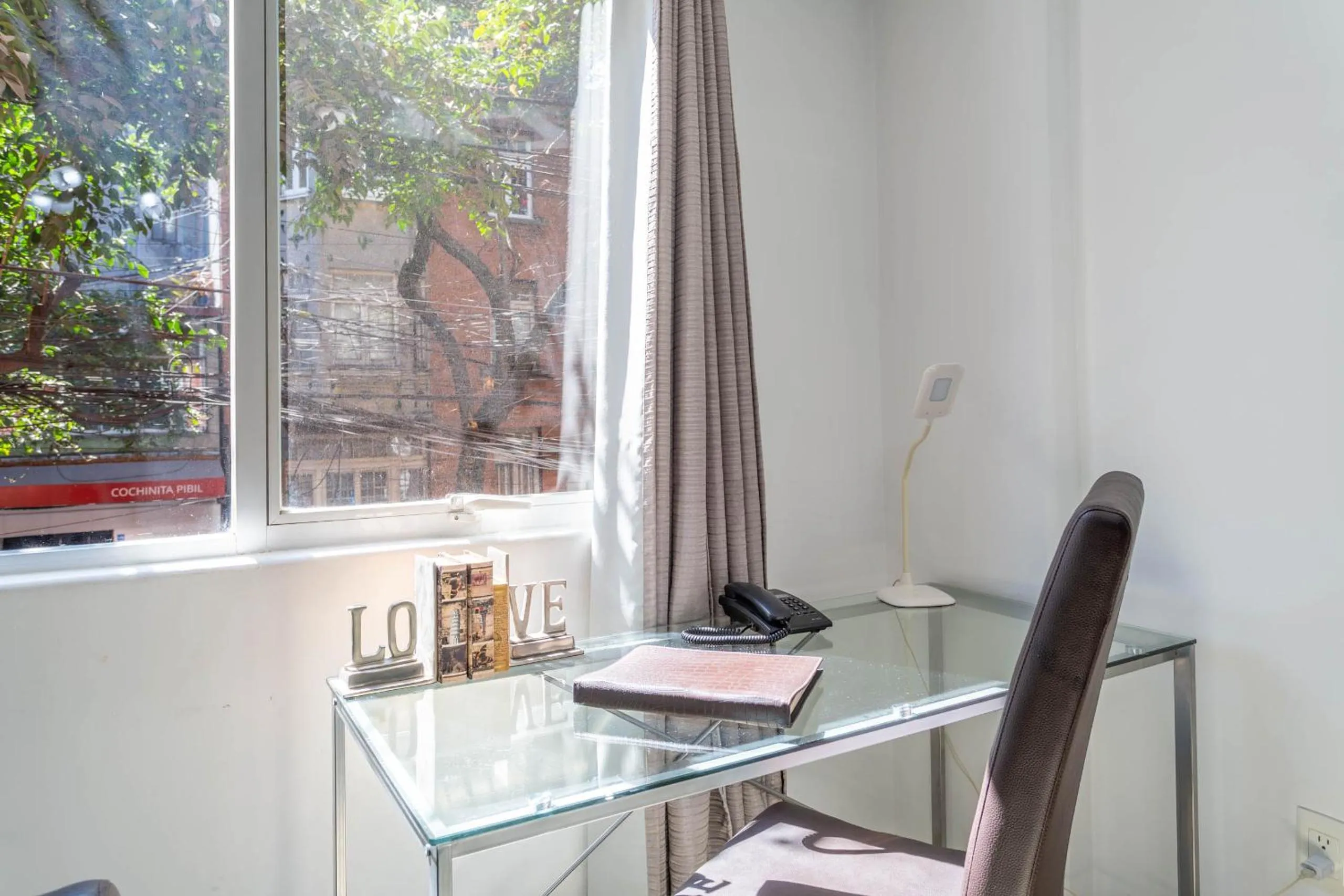 Seating area in Suites 259 Condesa