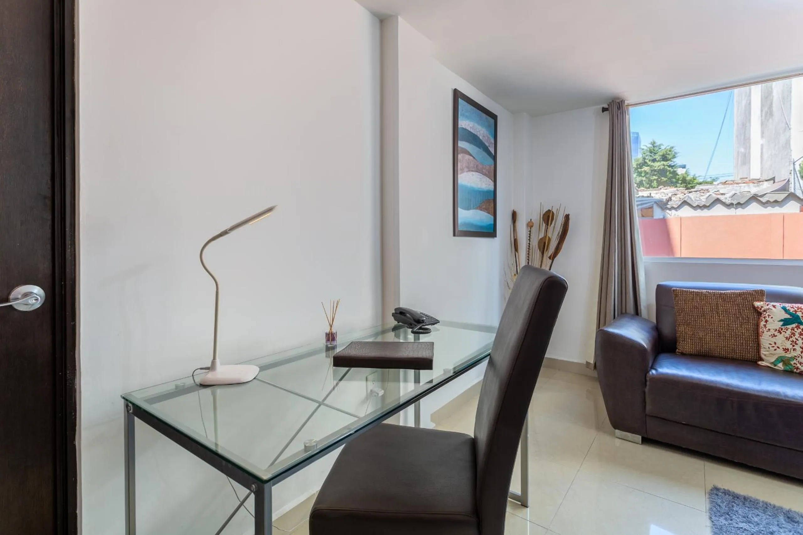 Seating area in Suites 259 Condesa
