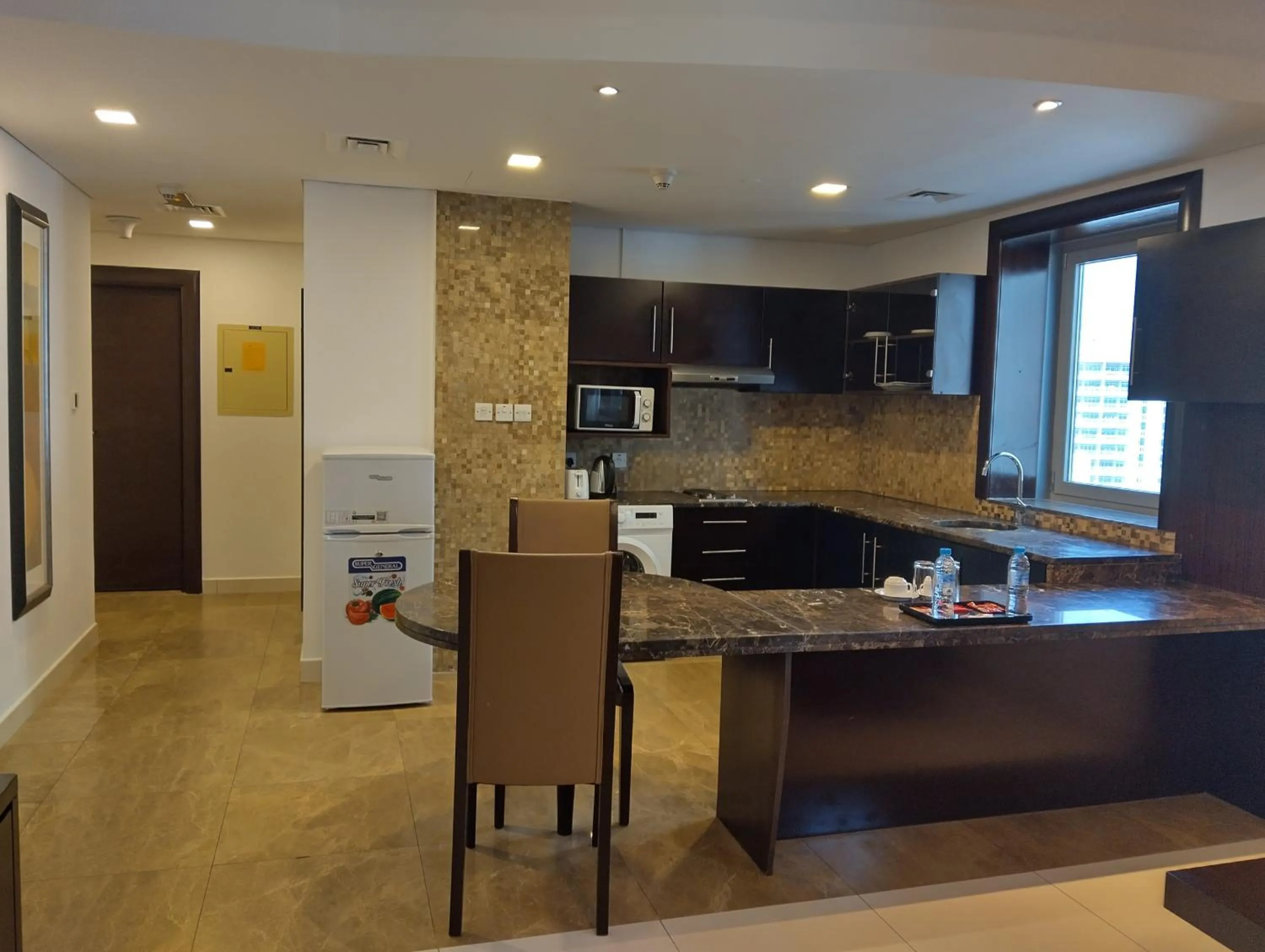 Kitchen or kitchenette in Tulip Creek Hotel Apartments