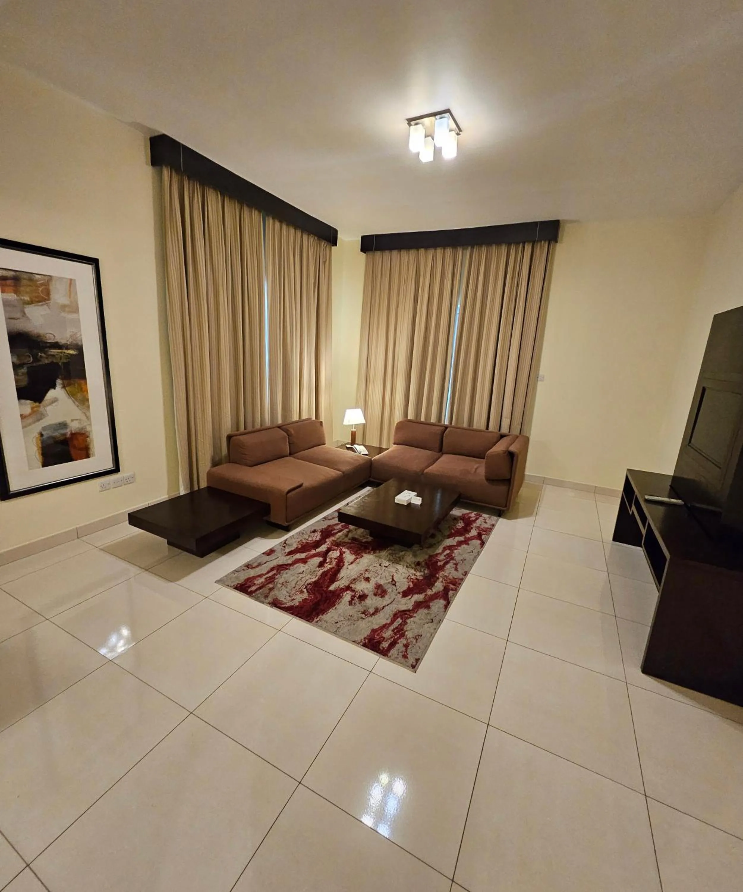 Communal lounge/ TV room in Tulip Creek Hotel Apartments