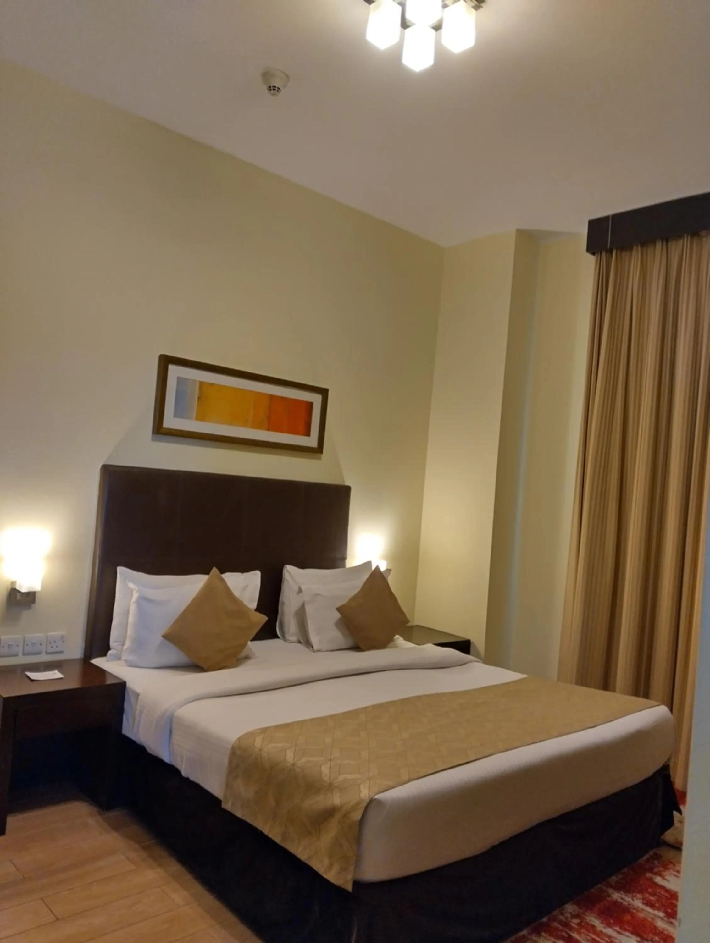 Bed in Tulip Creek Hotel Apartments