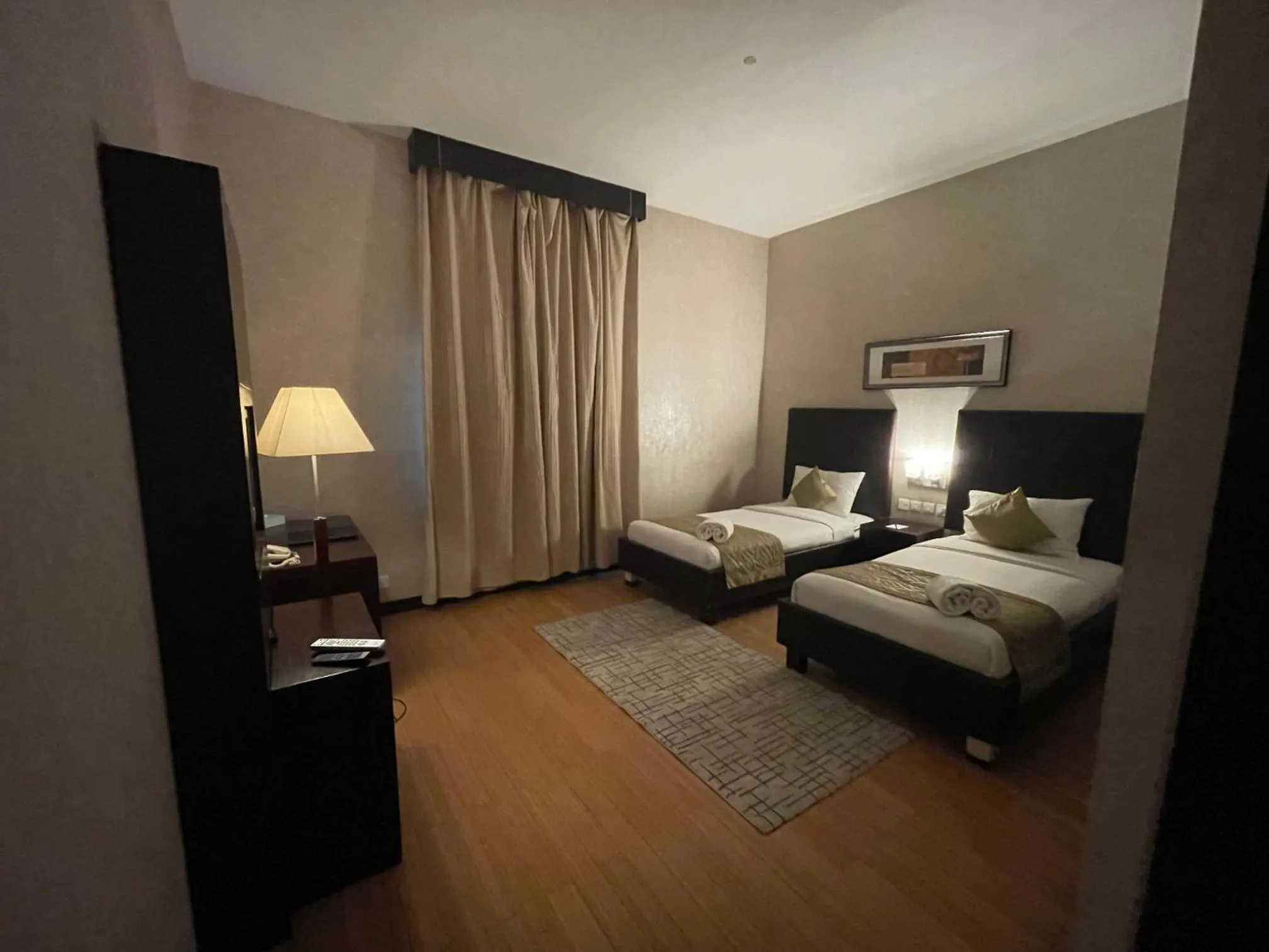 Bed in Tulip Creek Hotel Apartments