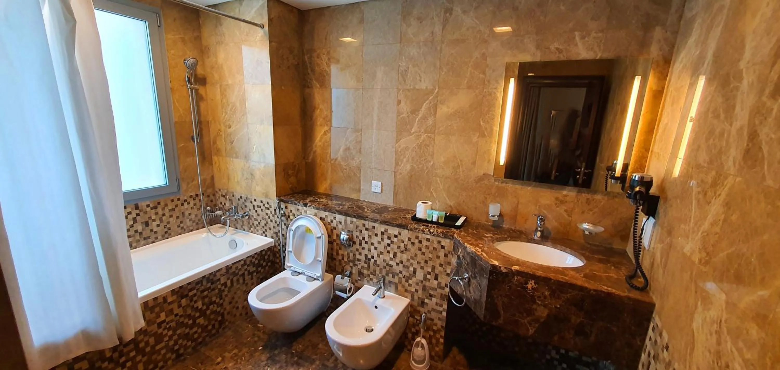 Shower in Tulip Creek Hotel Apartments