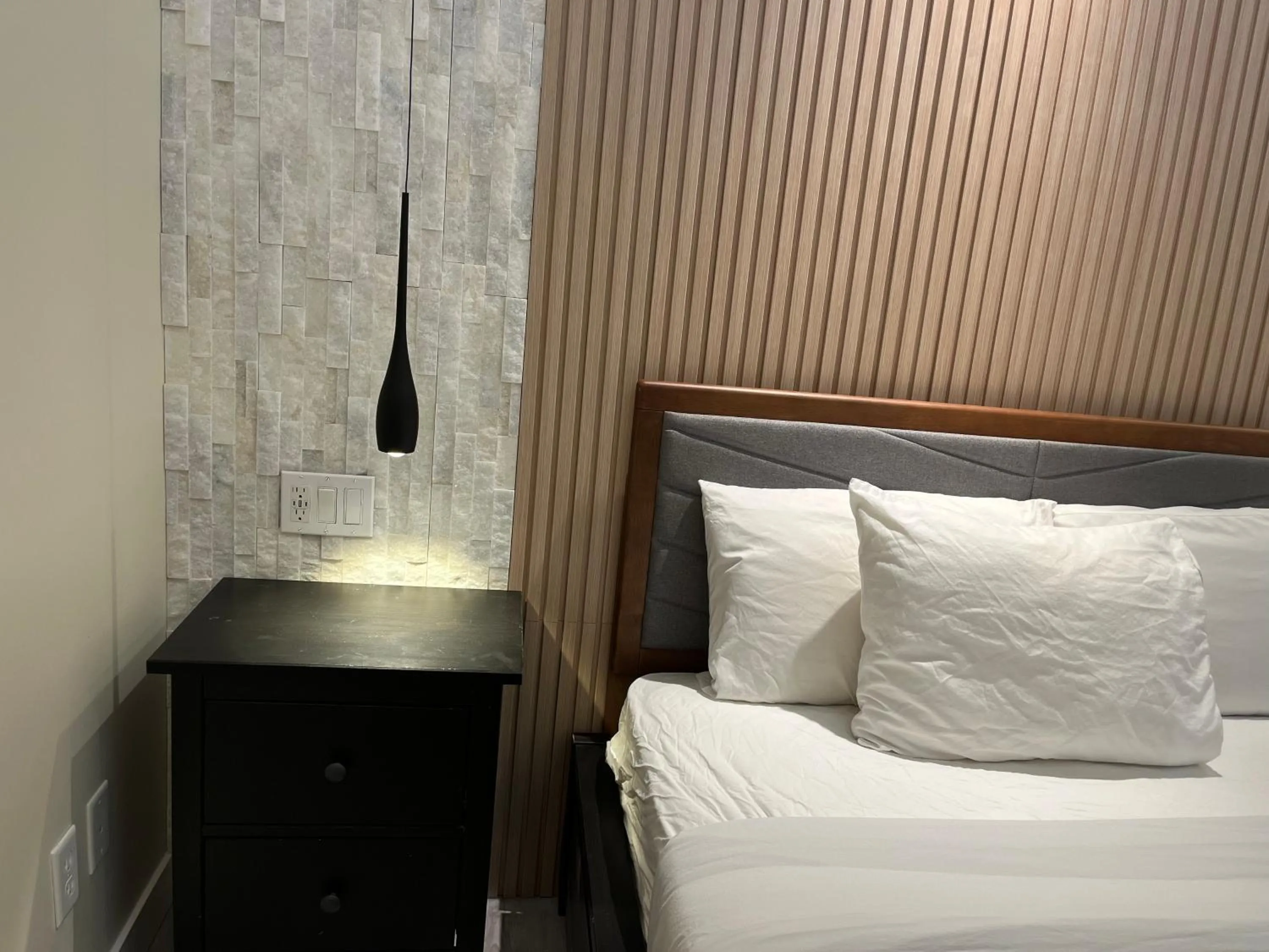 Bed in Banff Woods lodge