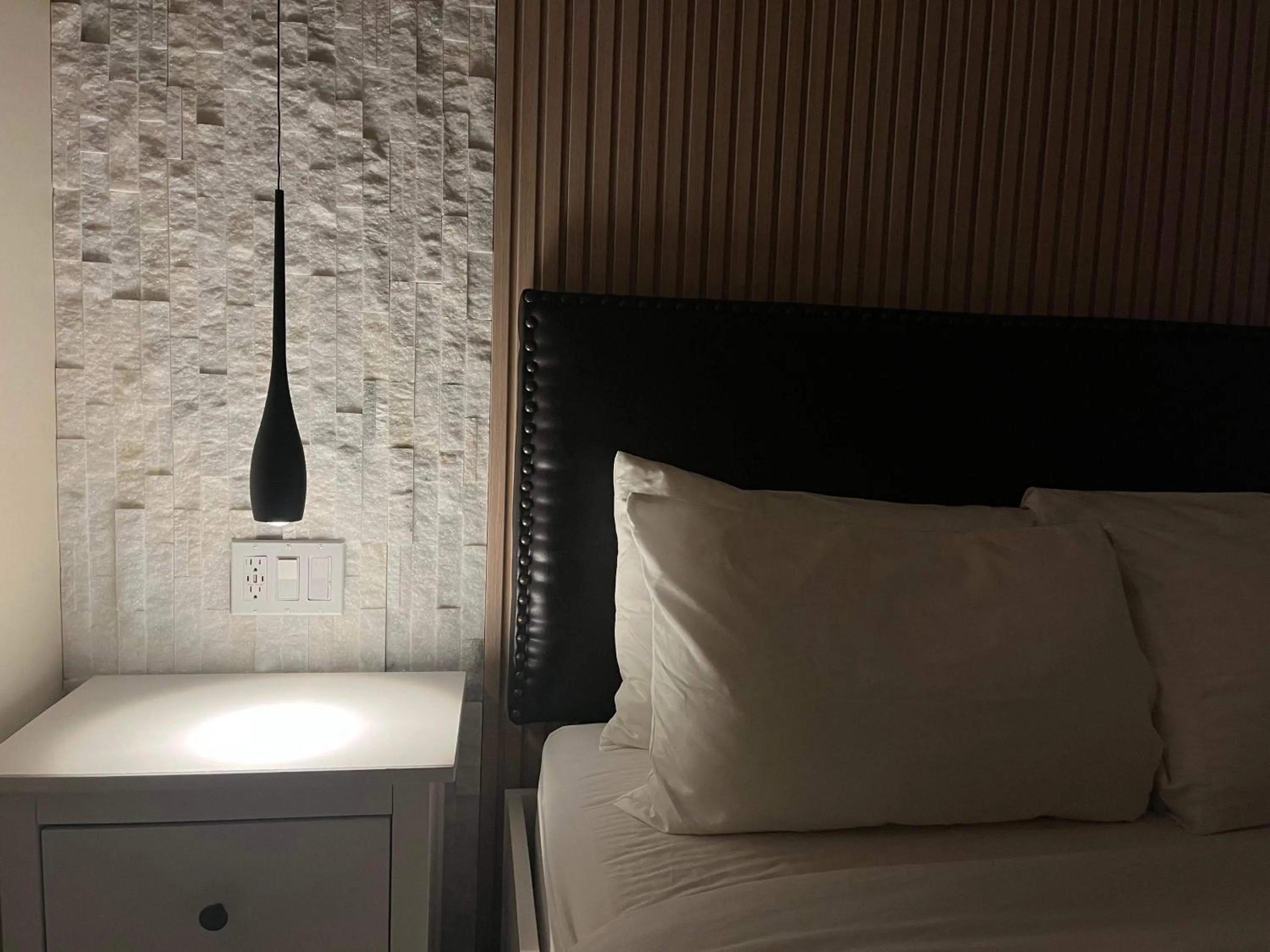 Bed in Banff Woods lodge