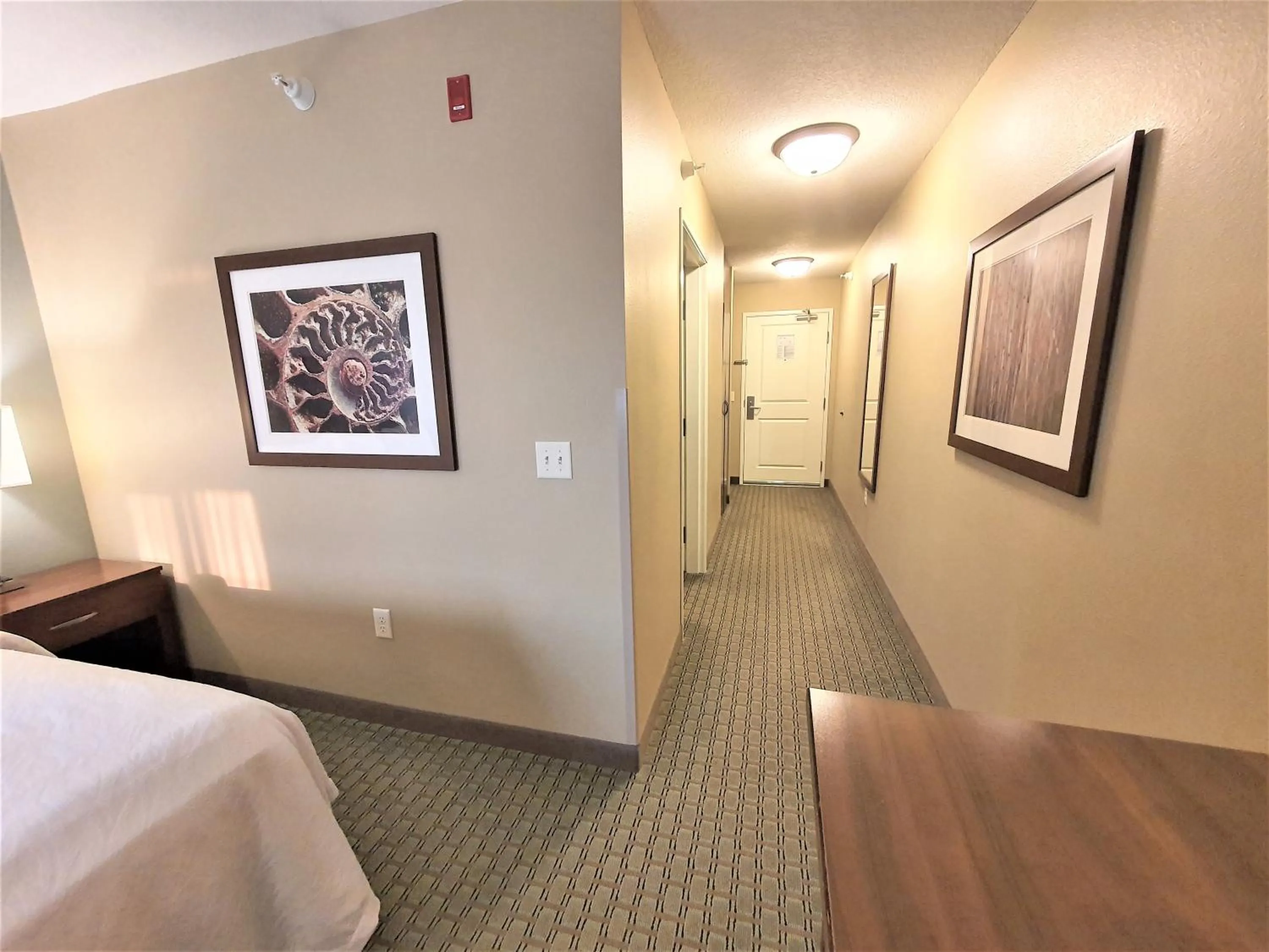 Bed in AmeriVu Inn and Suites - Chisago City