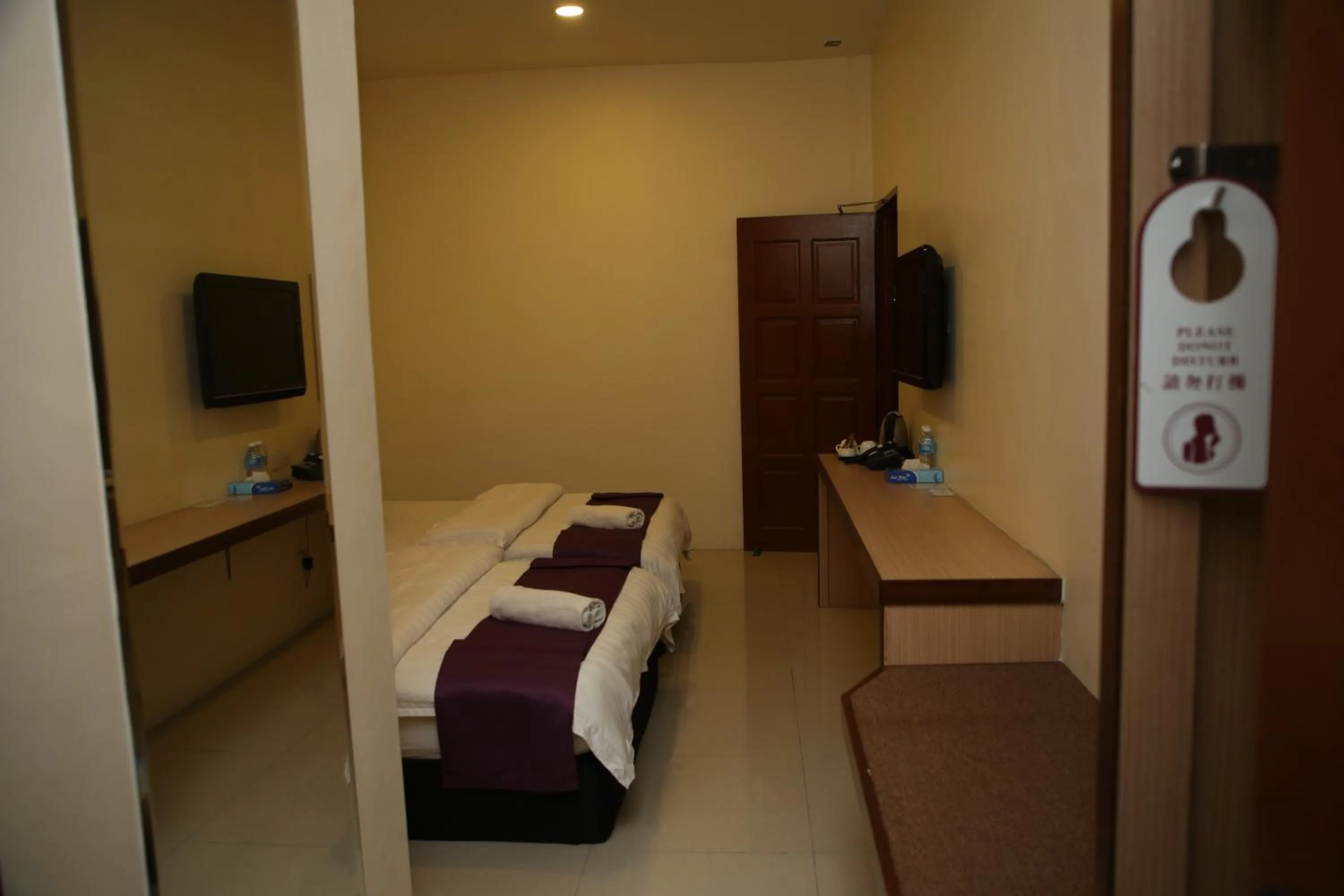 Bed in MY Fame Hotel