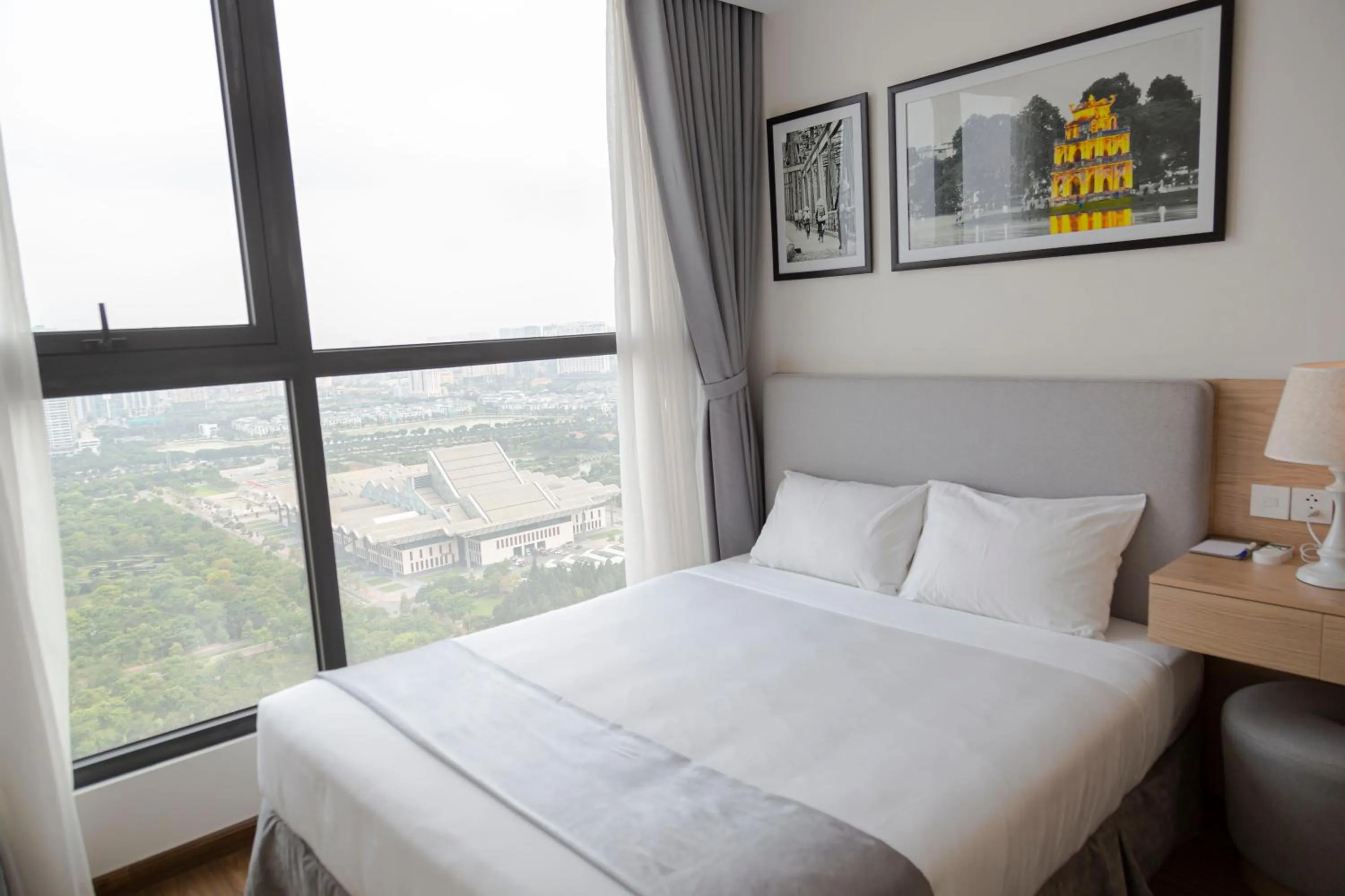 Bedroom, Bed in Aspaces Serviced Apartments - Vinhomes West Point