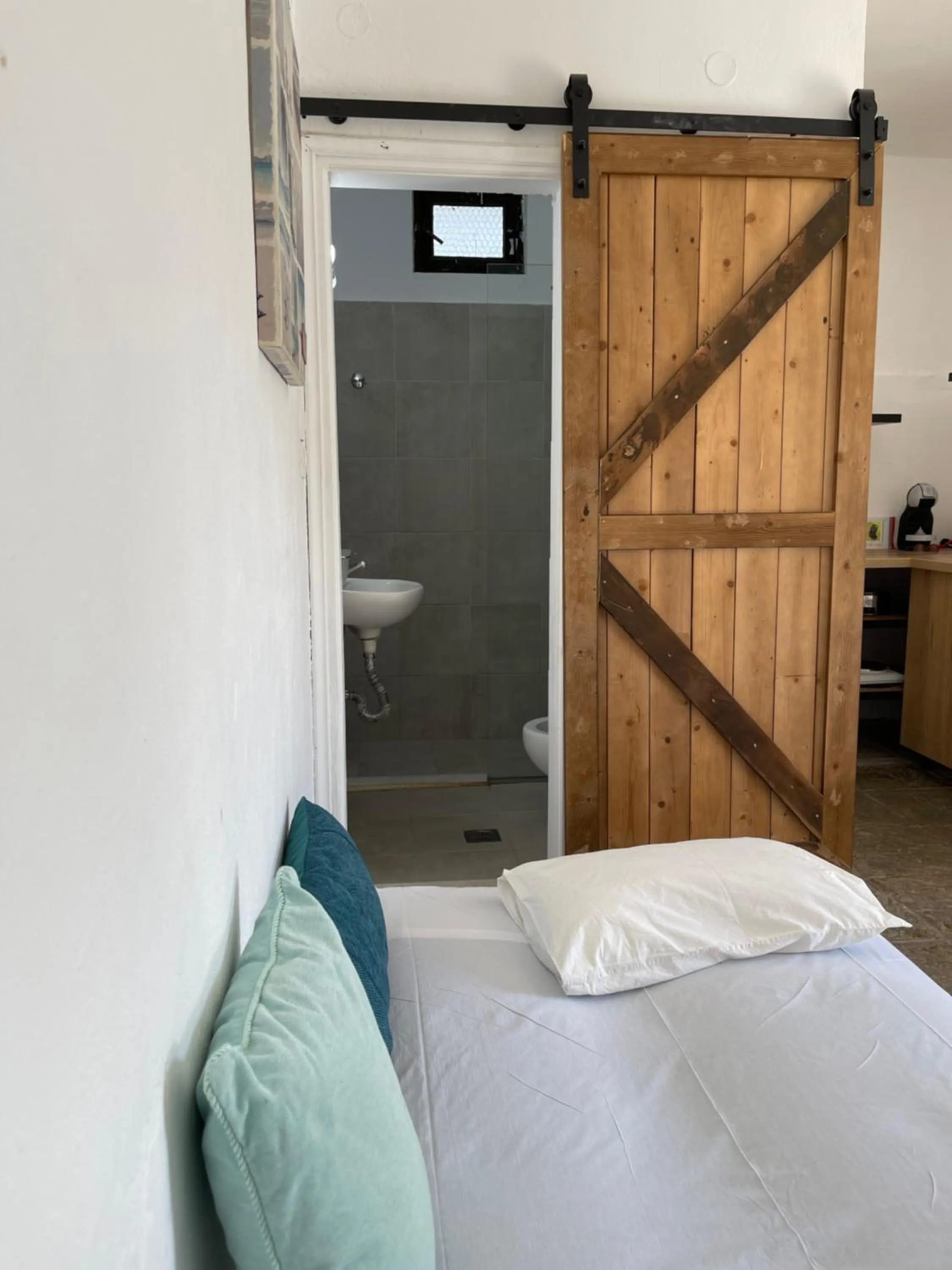 Bed in Eco Beach And Magic Garden Hotel