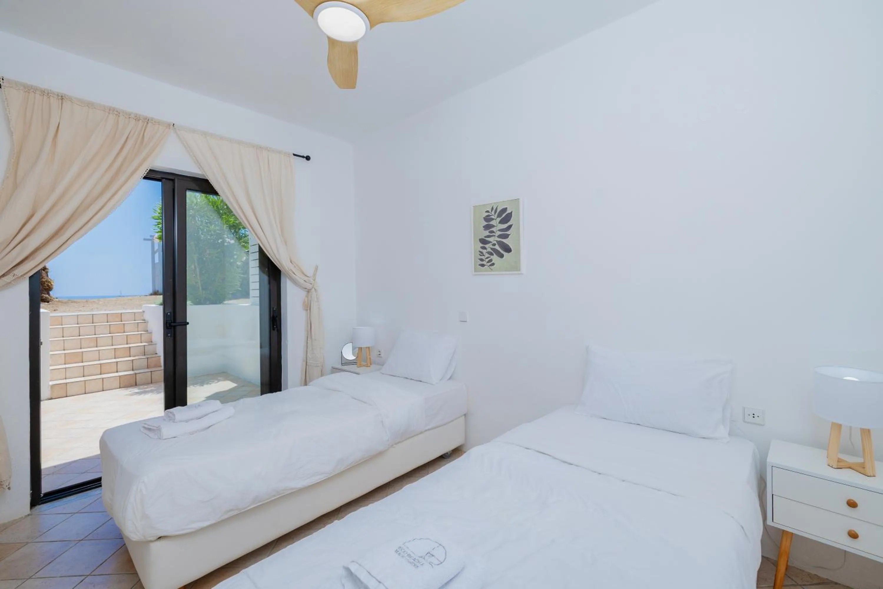 Bed in Eco Beach And Magic Garden Hotel