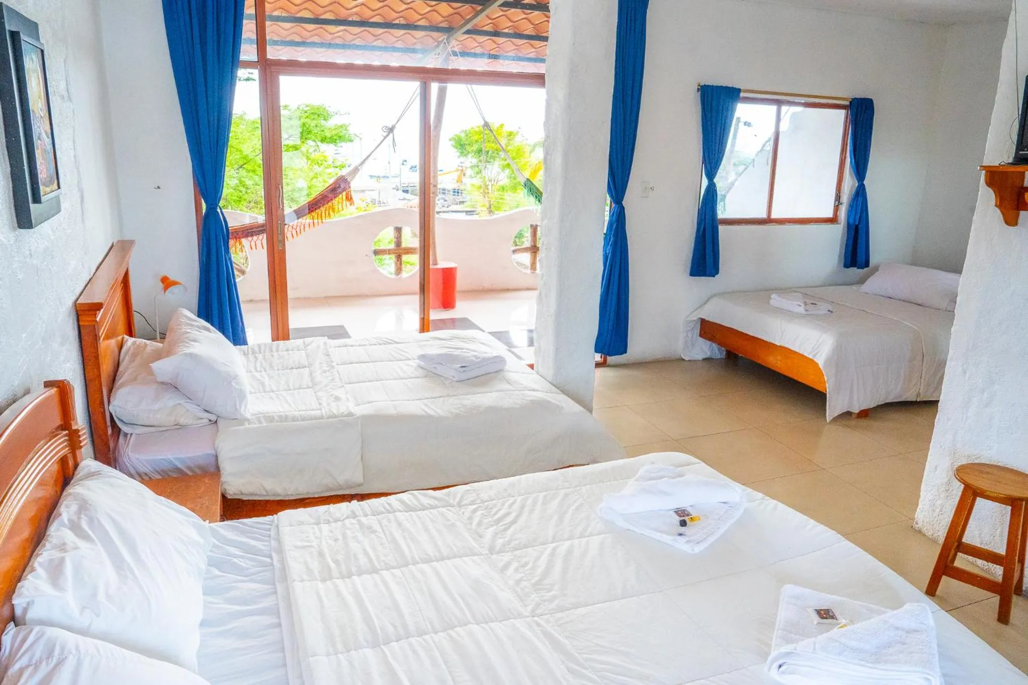 Bed in Royal Galápagos Inn