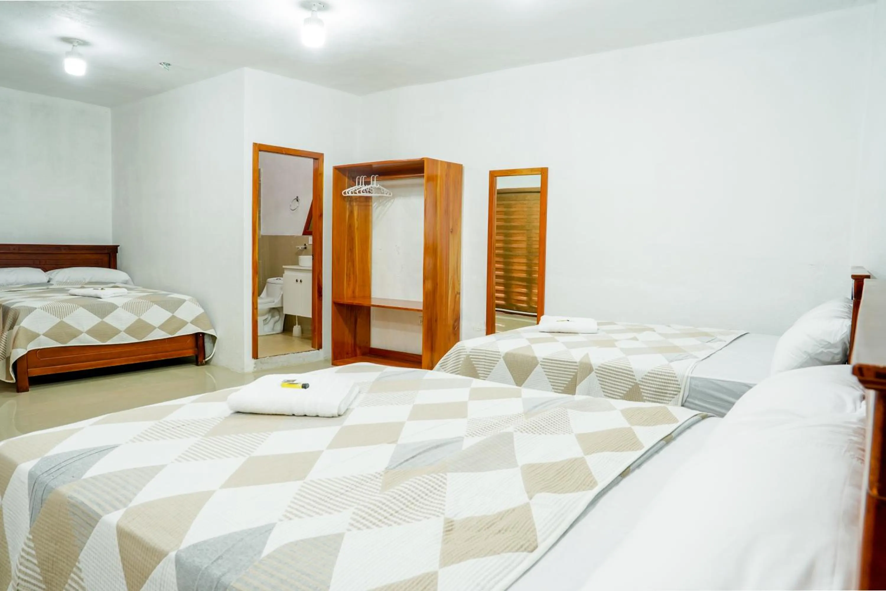 Bed in Royal Galápagos Inn