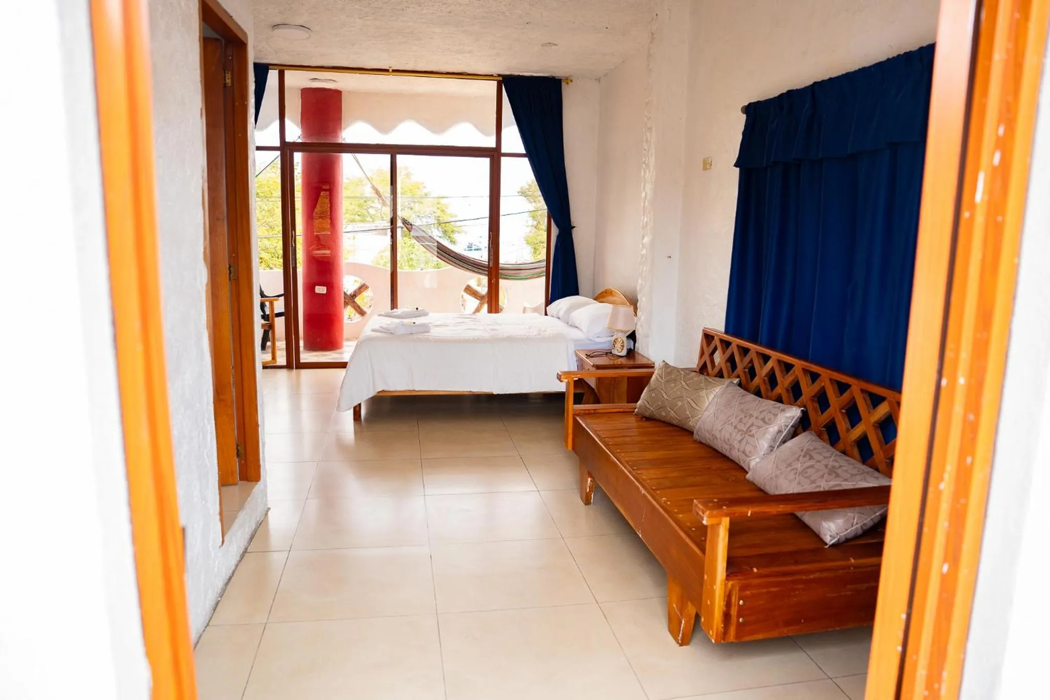 Bed in Royal Galápagos Inn