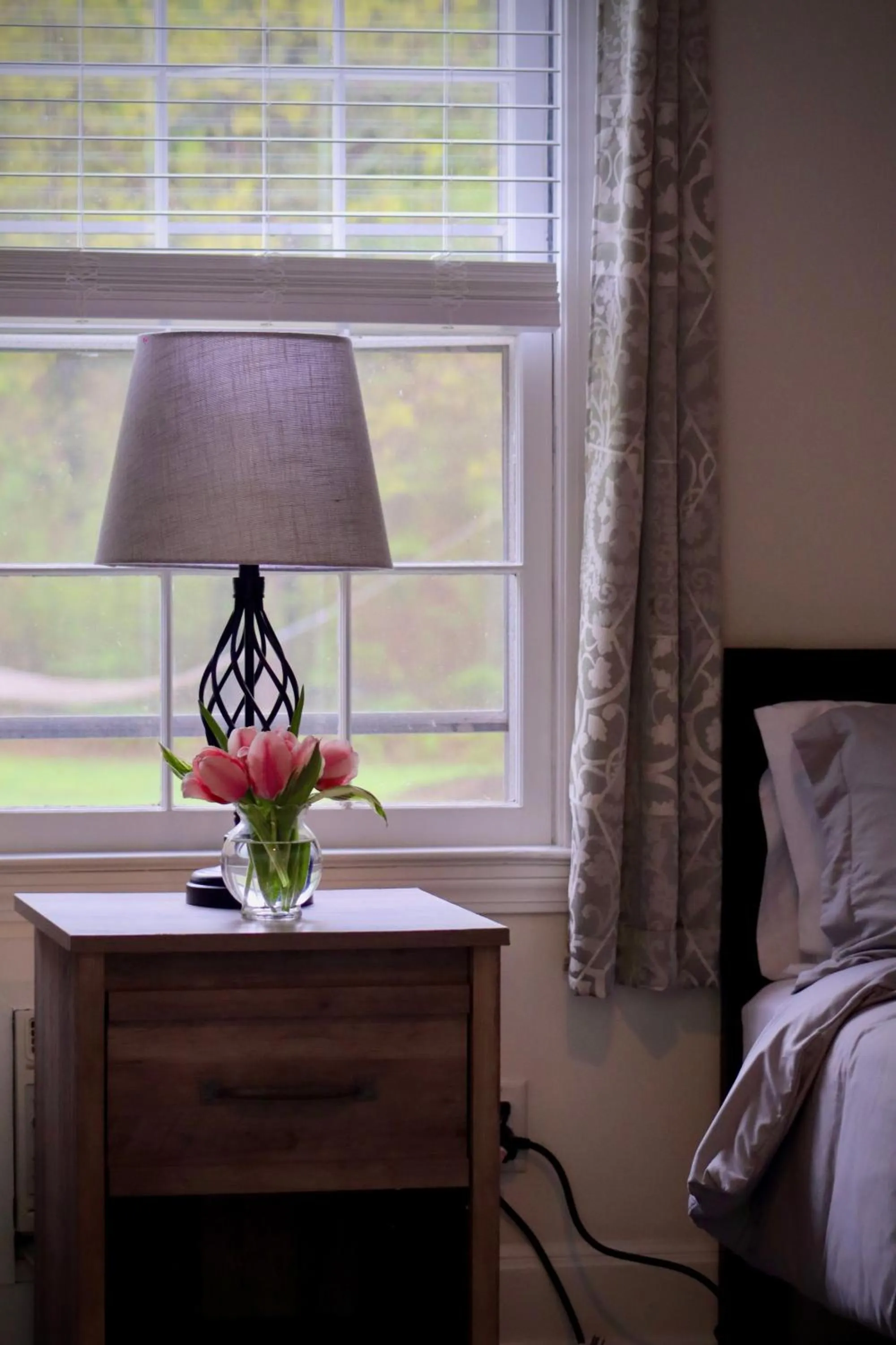 Bed in Arcady Mountain Motor Lodge