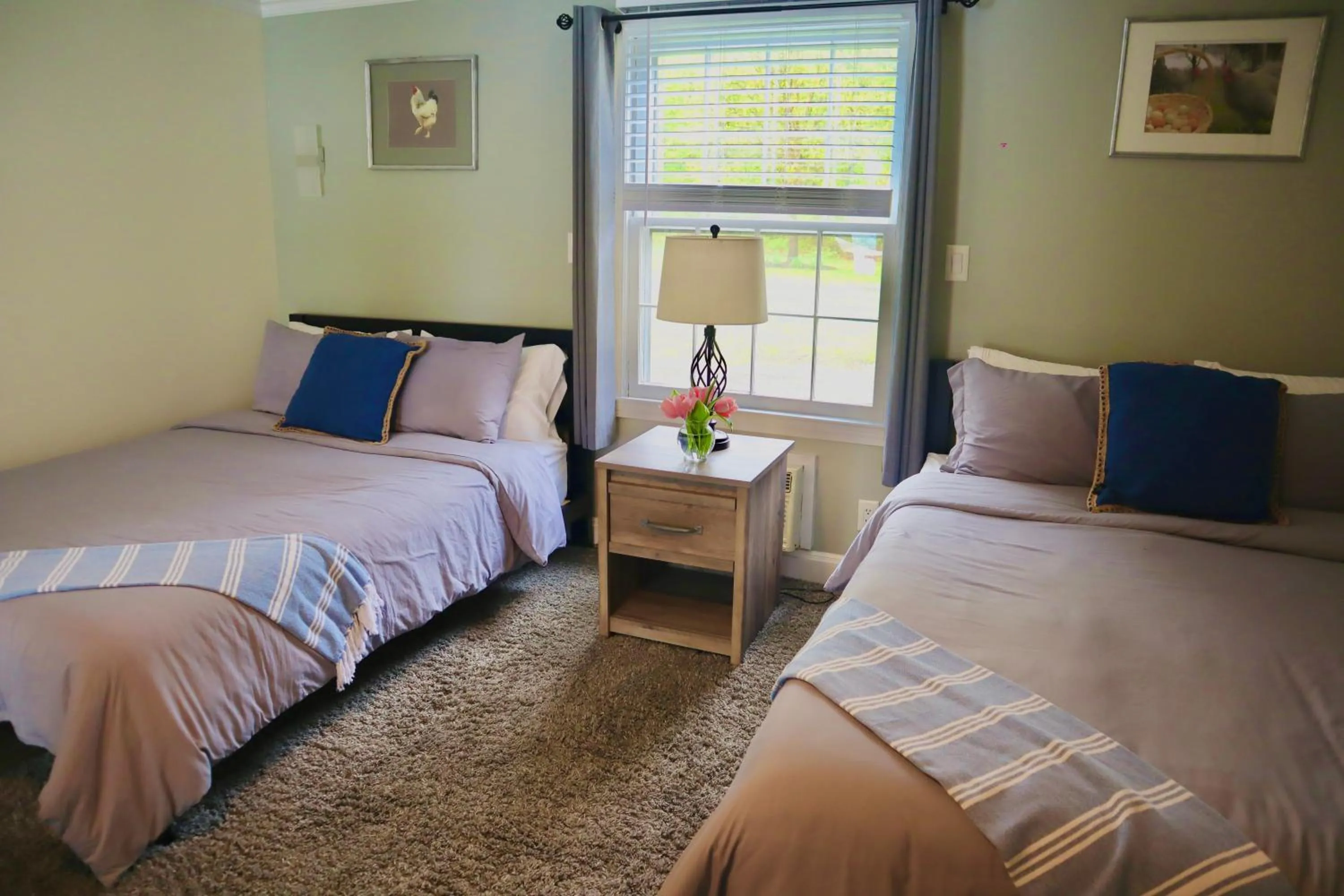 Bed in Arcady Mountain Motor Lodge