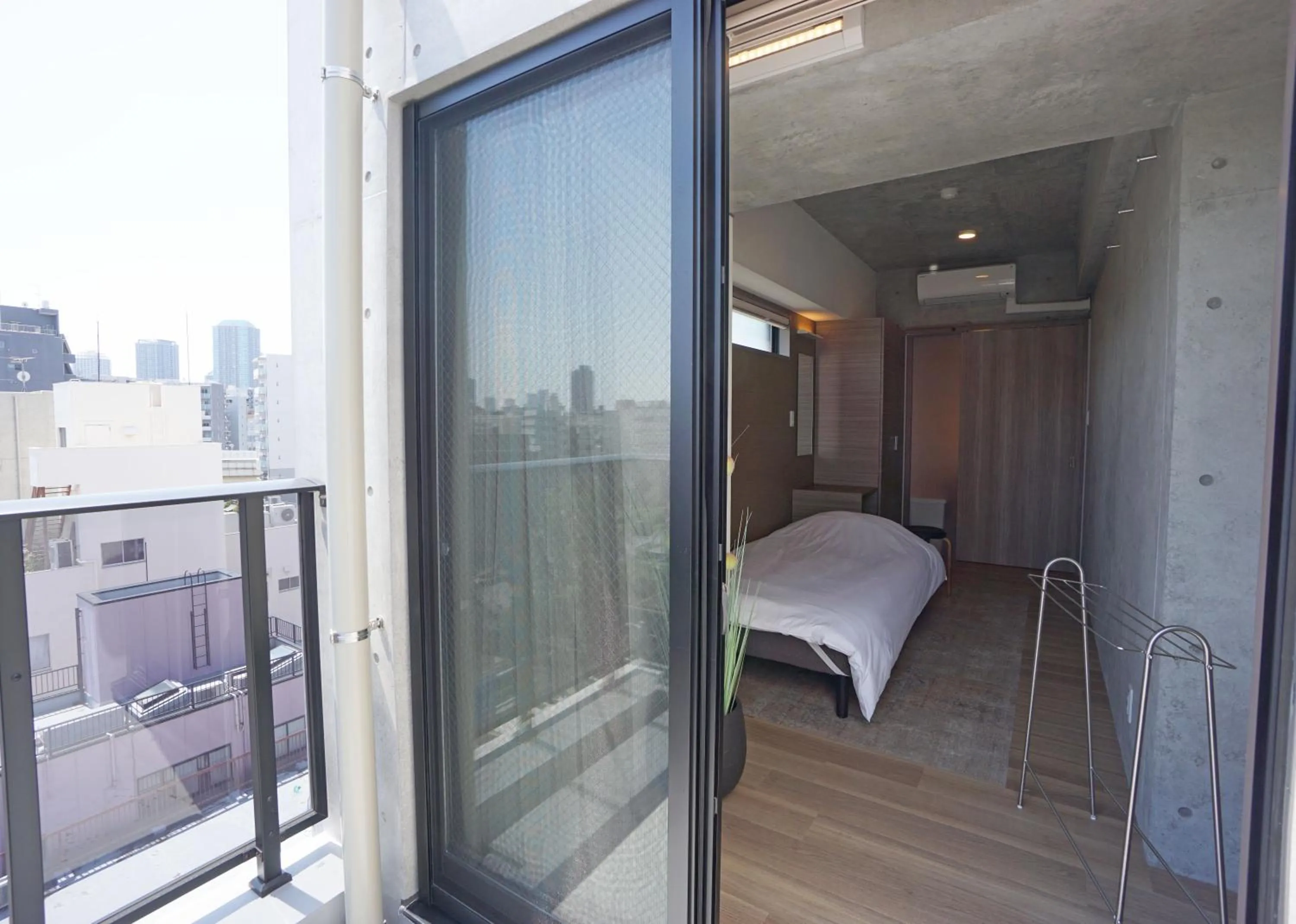 Balcony/Terrace, Bed in Prime Suites Tokyo