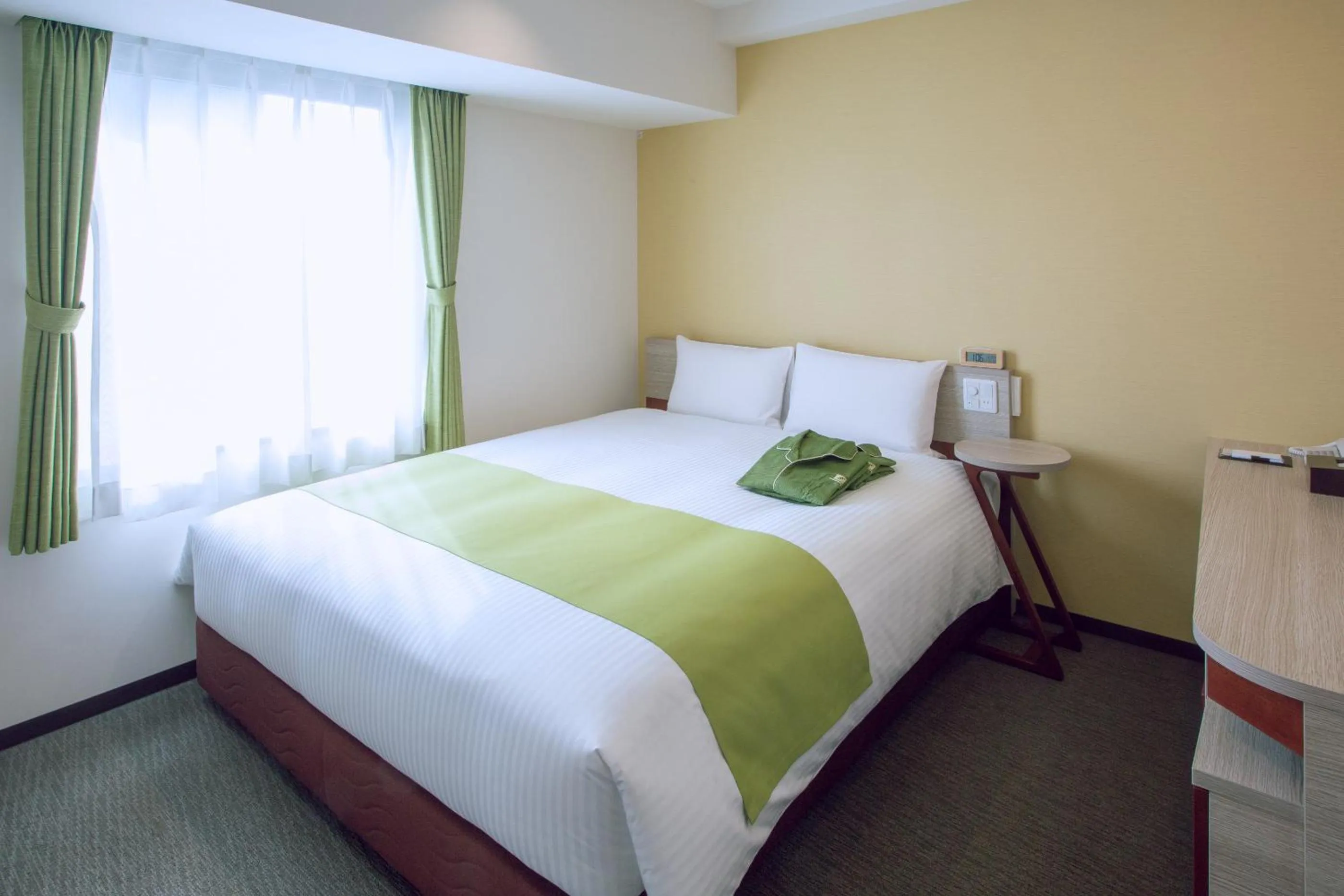 Bed in Kuretake Inn Premium Meieki minami